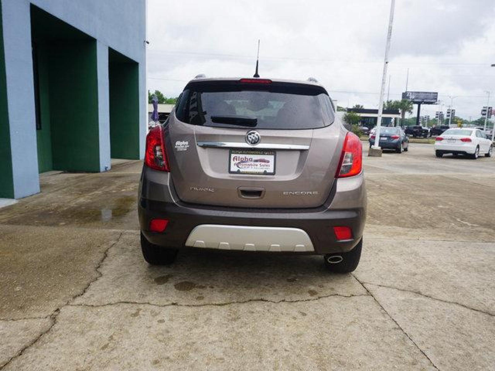 2014 Brown Buick Encore (KL4CJDSB3EB) with an 1.4L I4 Turbo engine, Automatic transmission, located at 6904 Johnston St., Lafayette, LA, 70503, (337) 988-1960, 30.143589, -92.100601 - Prices are subject to change as improvements done by the service dept. Prices are for Cash sales only, Plus TTL. This Vehicle is Serviced well and Warranties Available too. Easy Financing. Drives Great and everything works. Price subject to change as improvements done by the service dept. Easy CR - Photo #10