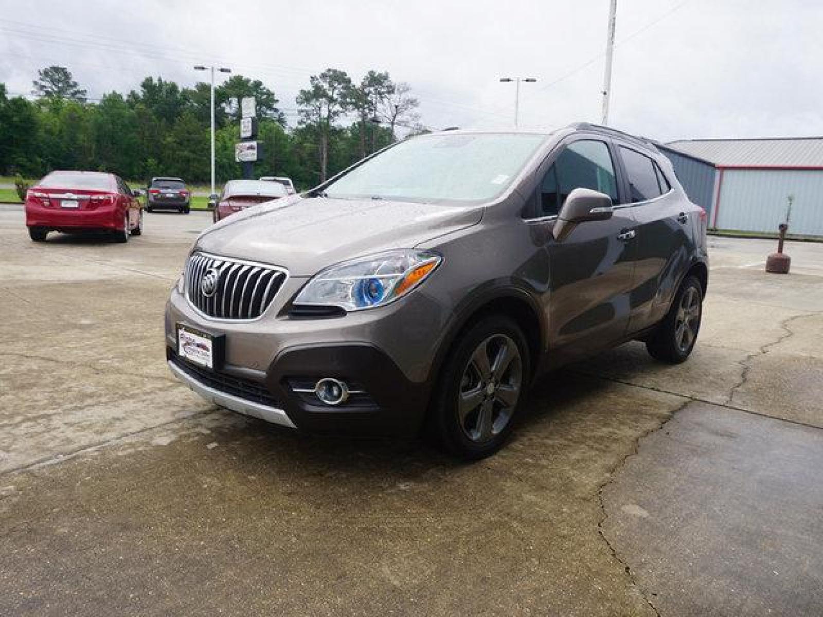 2014 Brown Buick Encore (KL4CJDSB3EB) with an 1.4L I4 Turbo engine, Automatic transmission, located at 6904 Johnston St., Lafayette, LA, 70503, (337) 988-1960, 30.143589, -92.100601 - Prices are subject to change as improvements done by the service dept. Prices are for Cash sales only, Plus TTL. This Vehicle is Serviced well and Warranties Available too. Easy Financing. Drives Great and everything works. Price subject to change as improvements done by the service dept. Easy CR - Photo #5
