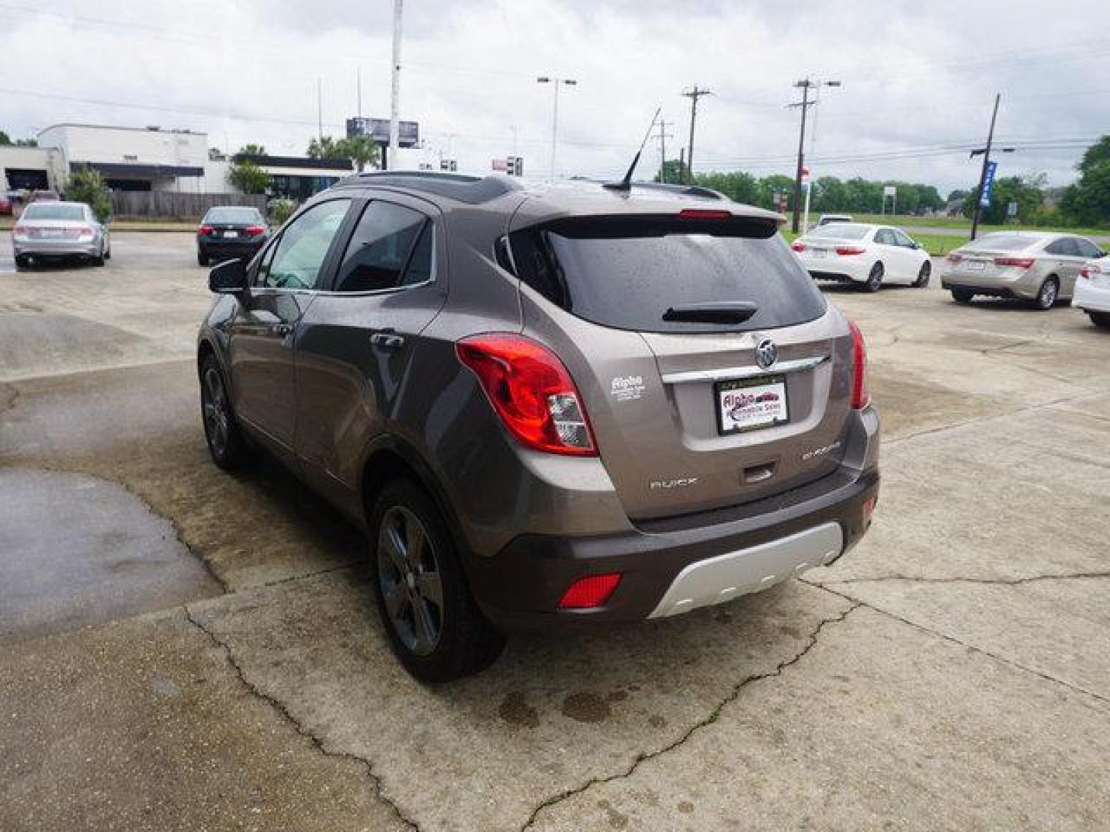 2014 Brown Buick Encore (KL4CJDSB3EB) with an 1.4L I4 Turbo engine, Automatic transmission, located at 6904 Johnston St., Lafayette, LA, 70503, (337) 988-1960, 30.143589, -92.100601 - Prices are subject to change as improvements done by the service dept. Prices are for Cash sales only, Plus TTL. This Vehicle is Serviced well and Warranties Available too. Easy Financing. Drives Great and everything works. Price subject to change as improvements done by the service dept. Easy CR - Photo #7
