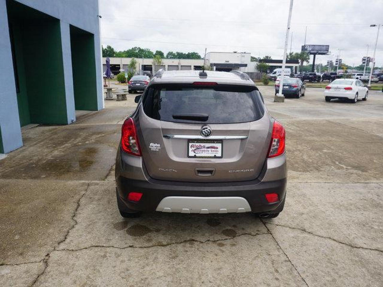 2015 Brown Buick Encore (KL4CJCSB4FB) with an 1.4L I4 Turbo engine, Automatic transmission, located at 6904 Johnston St., Lafayette, LA, 70503, (337) 988-1960, 30.143589, -92.100601 - Prices are subject to change as improvements done by the service dept. Prices are for Cash sales only, Plus TTL. This Vehicle is Serviced well and Warranties Available too. Easy Financing. Drives Great and everything works. Price subject to change as improvements done by the service dept. Easy CR - Photo #9
