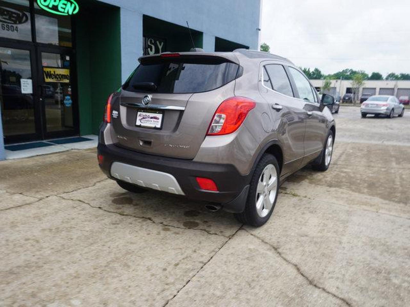 2015 Brown Buick Encore (KL4CJCSB4FB) with an 1.4L I4 Turbo engine, Automatic transmission, located at 6904 Johnston St., Lafayette, LA, 70503, (337) 988-1960, 30.143589, -92.100601 - Prices are subject to change as improvements done by the service dept. Prices are for Cash sales only, Plus TTL. This Vehicle is Serviced well and Warranties Available too. Easy Financing. Drives Great and everything works. Price subject to change as improvements done by the service dept. Easy CR - Photo #12
