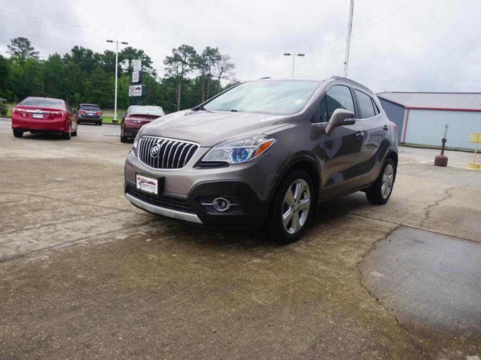 2015 Brown Buick Encore (KL4CJCSB4FB) with an 1.4L I4 Turbo engine, Automatic transmission, located at 6904 Johnston St., Lafayette, LA, 70503, (337) 988-1960, 30.143589, -92.100601 - Prices are subject to change as improvements done by the service dept. Prices are for Cash sales only, Plus TTL. This Vehicle is Serviced well and Warranties Available too. Easy Financing. Drives Great and everything works. Price subject to change as improvements done by the service dept. Easy CR - Photo #5