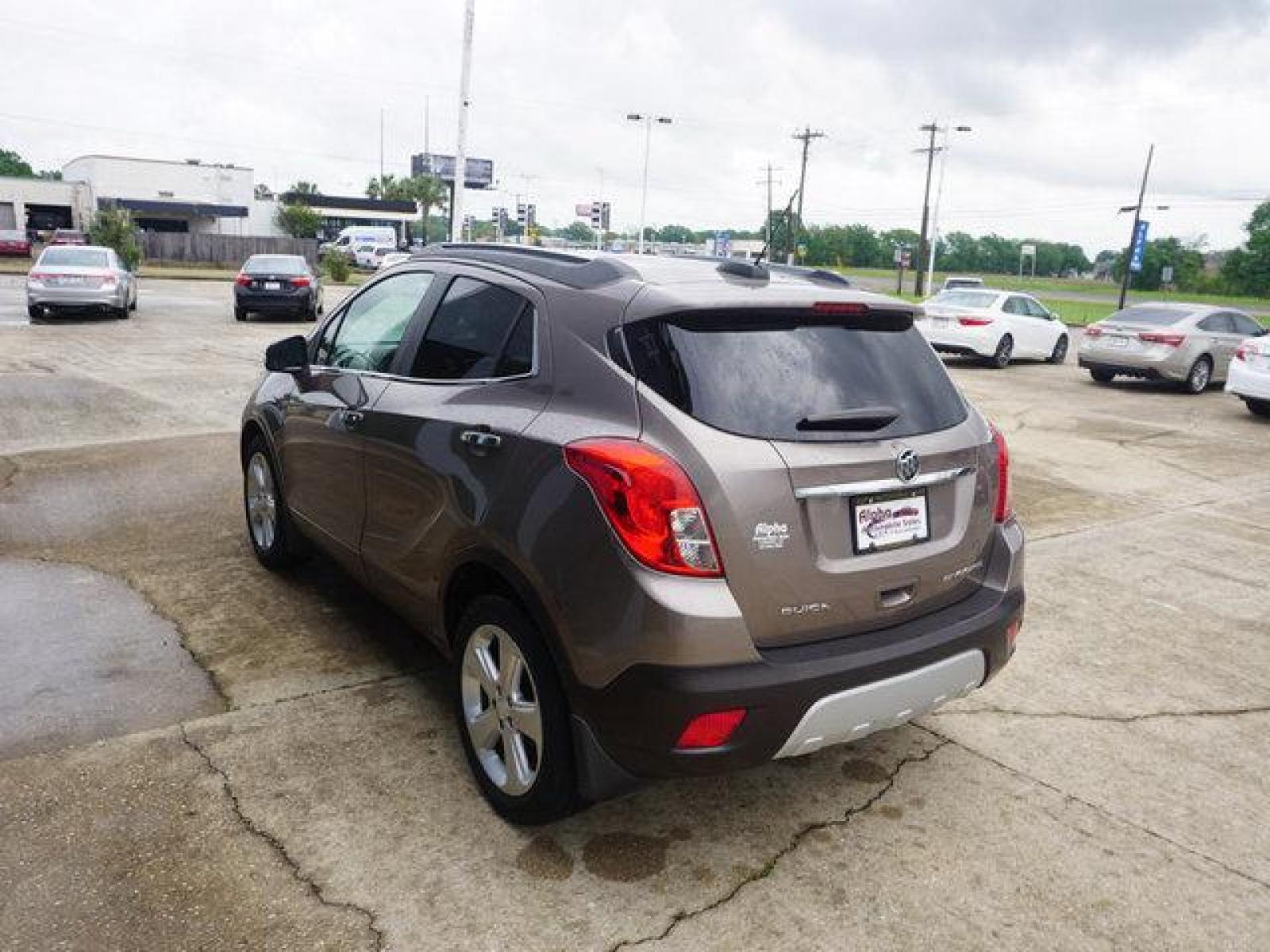 2015 Brown Buick Encore (KL4CJCSB4FB) with an 1.4L I4 Turbo engine, Automatic transmission, located at 6904 Johnston St., Lafayette, LA, 70503, (337) 988-1960, 30.143589, -92.100601 - Prices are subject to change as improvements done by the service dept. Prices are for Cash sales only, Plus TTL. This Vehicle is Serviced well and Warranties Available too. Easy Financing. Drives Great and everything works. Price subject to change as improvements done by the service dept. Easy CR - Photo #7