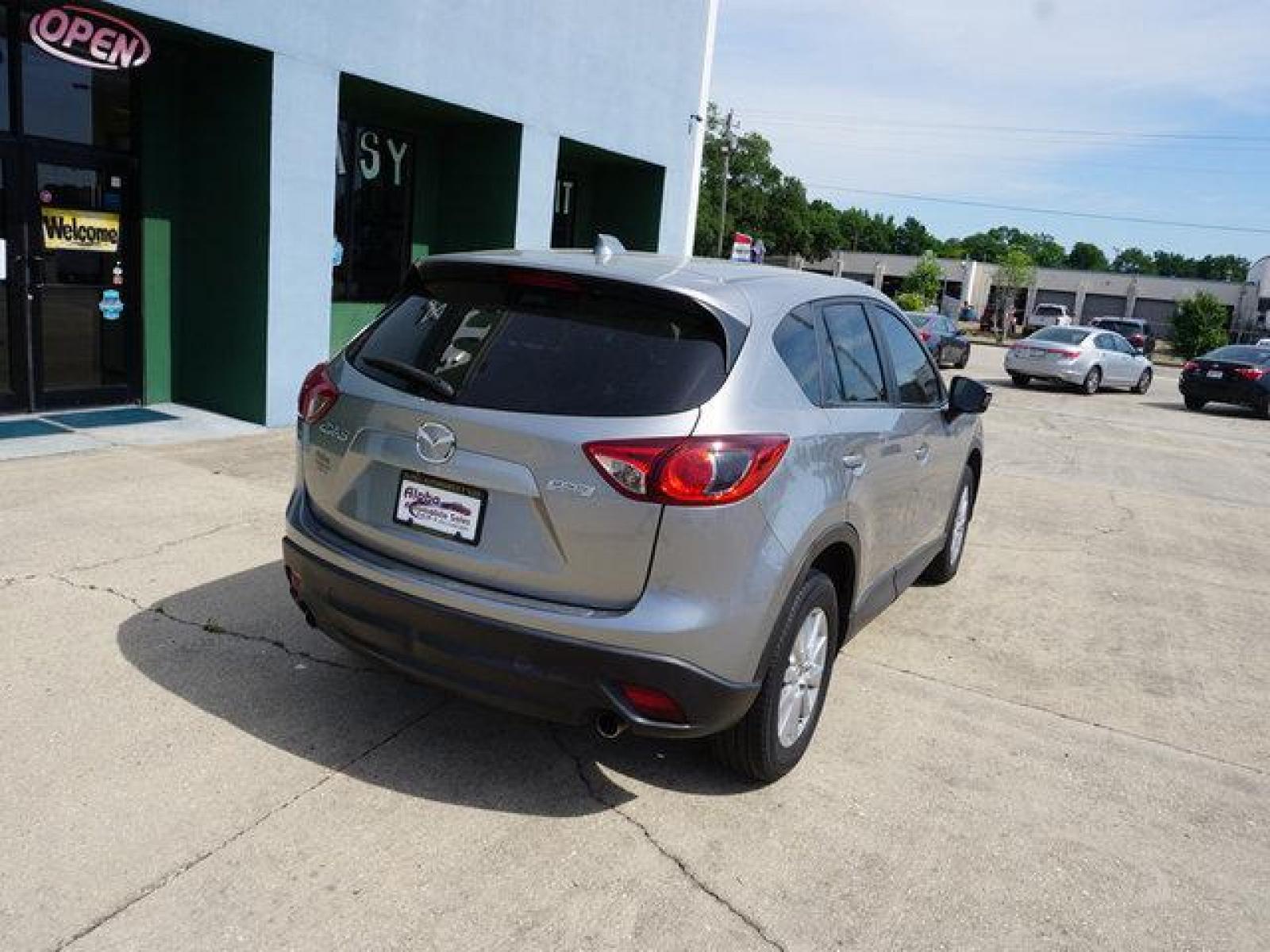2014 Silver Mazda CX-5 (JM3KE2CY6E0) with an 2.5L 4Cyl engine, Automatic transmission, located at 6904 Johnston St., Lafayette, LA, 70503, (337) 988-1960, 30.143589, -92.100601 - Prices are subject to change as improvements done by the service dept. Prices are for Cash sales only, Plus TTL. This Vehicle is Serviced well and Warranties Available too. Easy Financing. Drives Great and everything works. Price subject to change as improvements done by the service dept. Easy CR - Photo #11