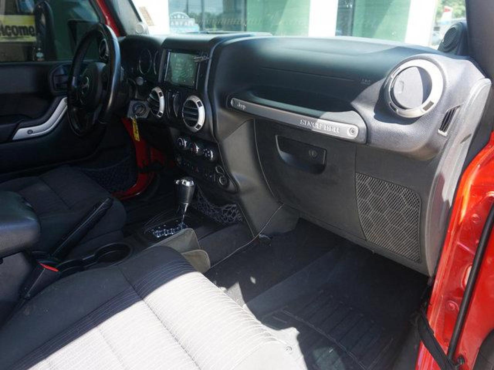 2012 Red Jeep Wrangler (1C4BJWCG9CL) with an 3.6L V6 engine, 6 Spd Automatic transmission, located at 6904 Johnston St., Lafayette, LA, 70503, (337) 988-1960, 30.143589, -92.100601 - beautiful Jeep Prices are subject to change as improvements done by the service dept. Prices are for Cash sales only, Plus TTL. This Vehicle is Serviced well and Warranties Available too. Easy Financing. Drives Great and everything works. Price subject to change as improvements done by the servi - Photo #17