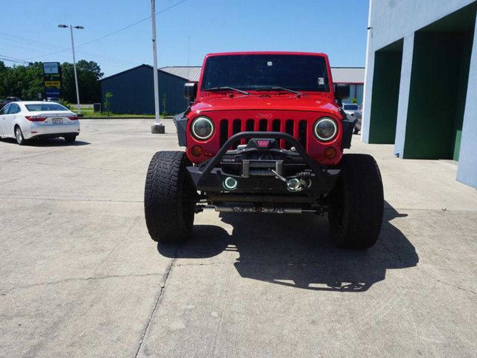 2012 Red Jeep Wrangler (1C4BJWCG9CL) with an 3.6L V6 engine, 6 Spd Automatic transmission, located at 6904 Johnston St., Lafayette, LA, 70503, (337) 988-1960, 30.143589, -92.100601 - beautiful Jeep Prices are subject to change as improvements done by the service dept. Prices are for Cash sales only, Plus TTL. This Vehicle is Serviced well and Warranties Available too. Easy Financing. Drives Great and everything works. Price subject to change as improvements done by the servi - Photo #3