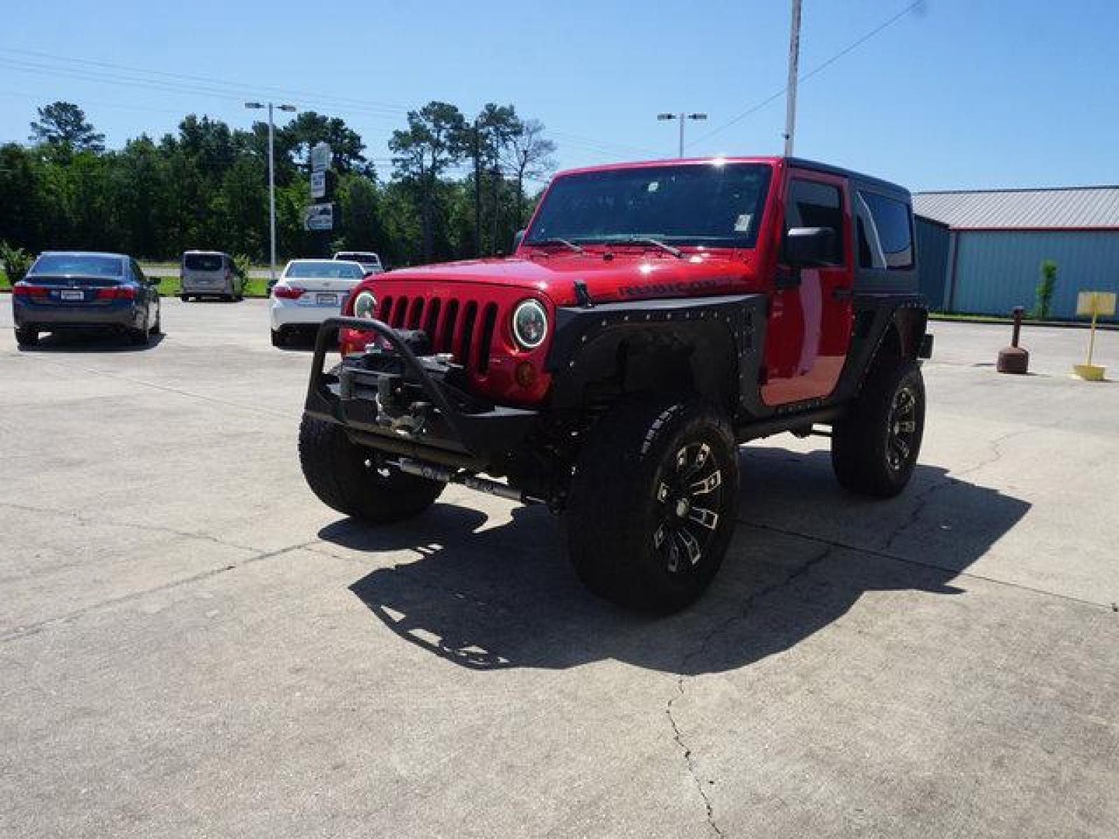 2012 Red Jeep Wrangler (1C4BJWCG9CL) with an 3.6L V6 engine, 6 Spd Automatic transmission, located at 6904 Johnston St., Lafayette, LA, 70503, (337) 988-1960, 30.143589, -92.100601 - beautiful Jeep Prices are subject to change as improvements done by the service dept. Prices are for Cash sales only, Plus TTL. This Vehicle is Serviced well and Warranties Available too. Easy Financing. Drives Great and everything works. Price subject to change as improvements done by the servi - Photo #5