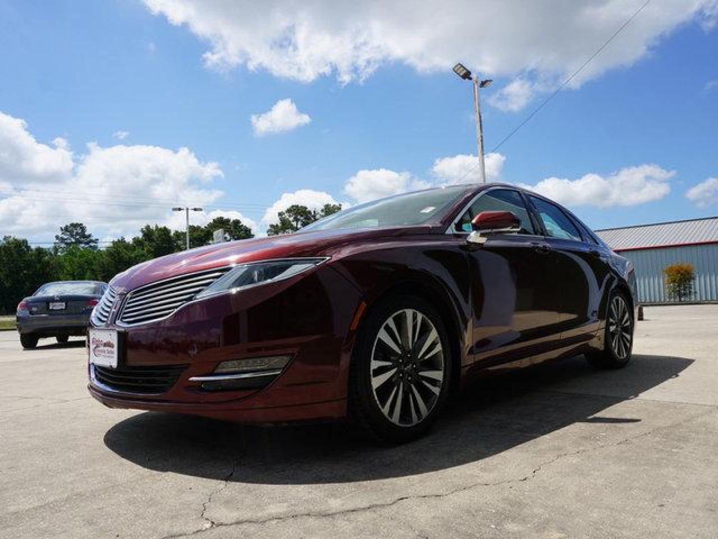 2015 Bronz Lincoln MKZ (3LN6L2JK7FR) with an 3.7 L 6 Cyl engine, Automatic transmission, located at 6904 Johnston St., Lafayette, LA, 70503, (337) 988-1960, 30.143589, -92.100601 - Beautiful low miles. This picture is just an imitation for photo only. The real vehicle is really nice and the picture will be updated soon. Prices are subject to change as improvements done by the service dept. Prices are for Cash sales only, Plus TTL. This Vehicle is Serviced well and Warranti - Photo#5