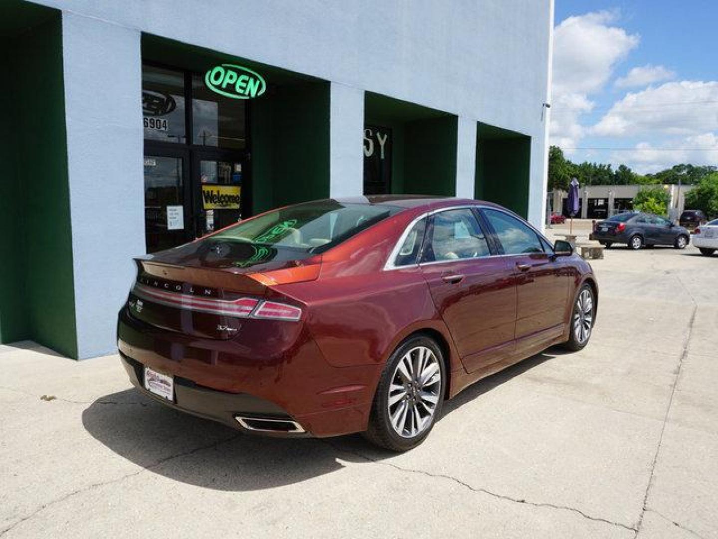 2015 Bronz Lincoln MKZ (3LN6L2JK7FR) with an 3.7 L 6 Cyl engine, Automatic transmission, located at 6904 Johnston St., Lafayette, LA, 70503, (337) 988-1960, 30.143589, -92.100601 - Beautiful low miles. This picture is just an imitation for photo only. The real vehicle is really nice and the picture will be updated soon. Prices are subject to change as improvements done by the service dept. Prices are for Cash sales only, Plus TTL. This Vehicle is Serviced well and Warranti - Photo#12