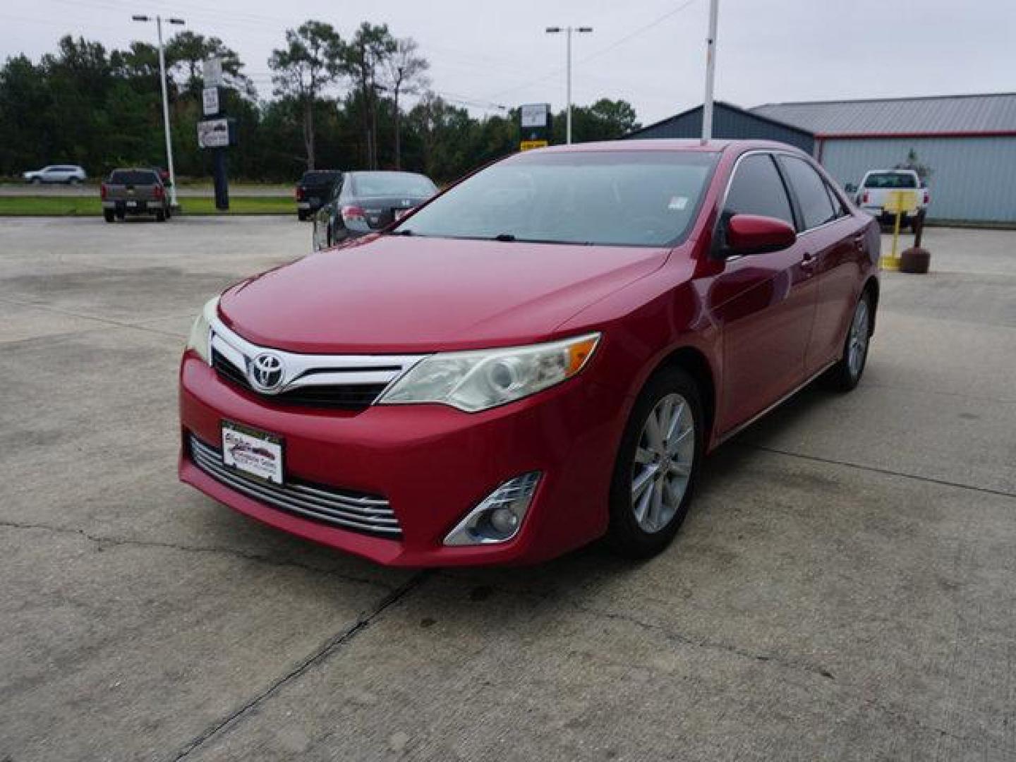 2014 Red Toyota Camry (4T1BK1FK2EU) with an 3.5L 6 Cyl engine, Automatic transmission, located at 6904 Johnston St., Lafayette, LA, 70503, (337) 988-1960, 30.143589, -92.100601 - Prices are subject to change as improvements done by the service dept. Prices are for Cash sales only, Plus TTL. This Vehicle is Serviced well and Warranties Available too. Easy Financing. Drives Great and everything works. Price subject to change as improvements done by the service dept. Easy CR - Photo#4