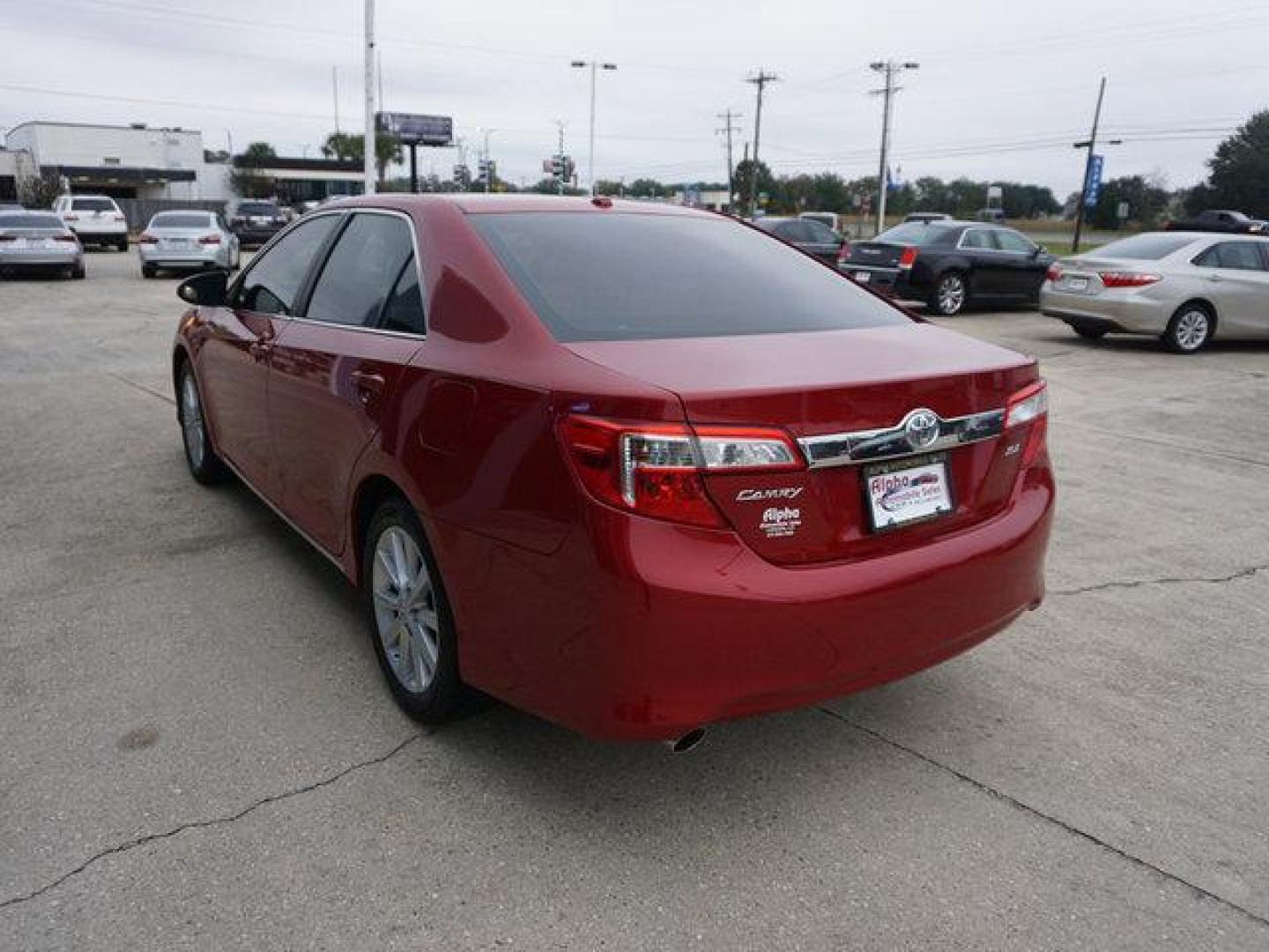 2014 Red Toyota Camry (4T1BK1FK2EU) with an 3.5L 6 Cyl engine, Automatic transmission, located at 6904 Johnston St., Lafayette, LA, 70503, (337) 988-1960, 30.143589, -92.100601 - Prices are subject to change as improvements done by the service dept. Prices are for Cash sales only, Plus TTL. This Vehicle is Serviced well and Warranties Available too. Easy Financing. Drives Great and everything works. Price subject to change as improvements done by the service dept. Easy CR - Photo#7