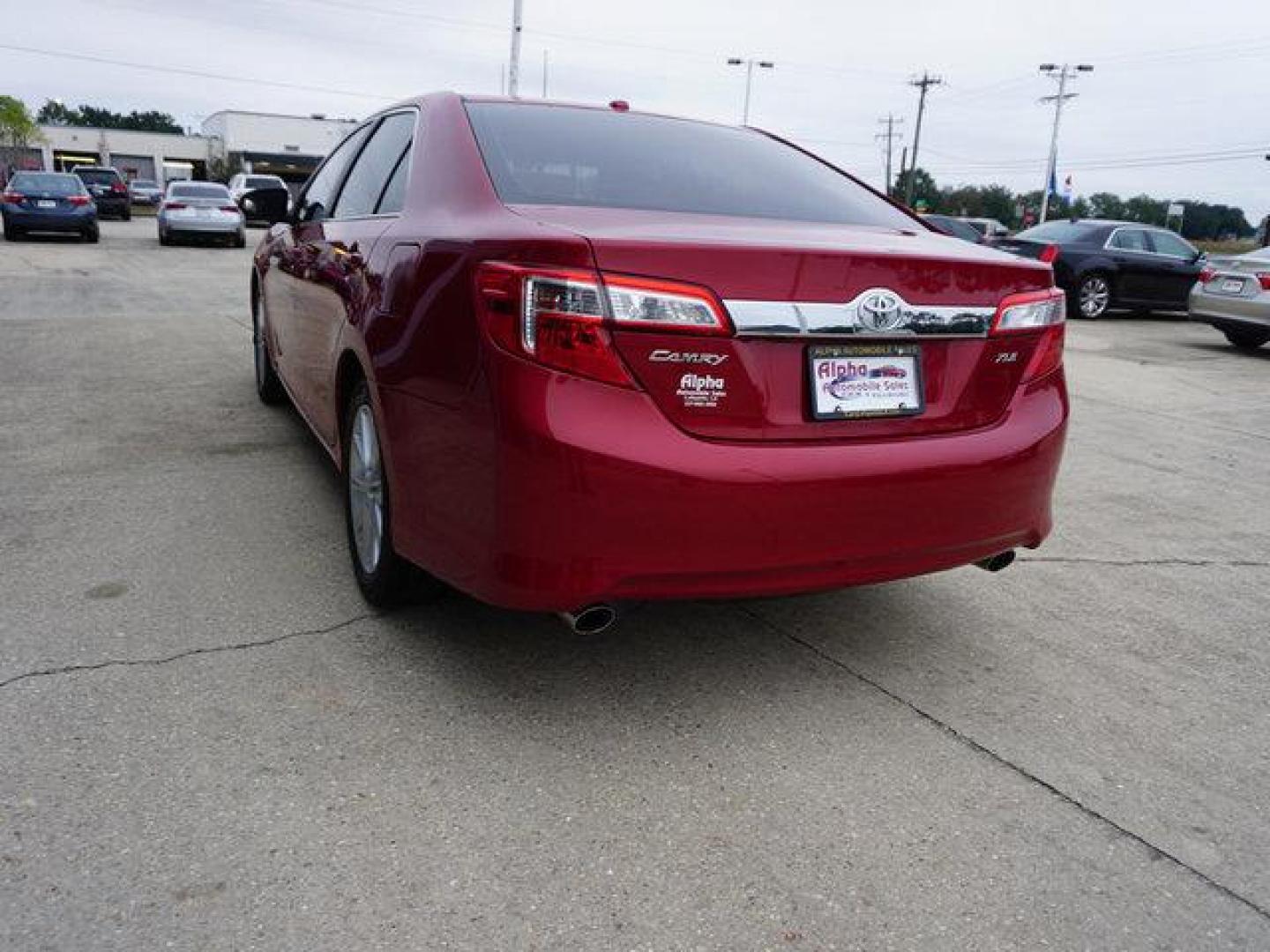 2014 Red Toyota Camry (4T1BK1FK2EU) with an 3.5L 6 Cyl engine, Automatic transmission, located at 6904 Johnston St., Lafayette, LA, 70503, (337) 988-1960, 30.143589, -92.100601 - Prices are subject to change as improvements done by the service dept. Prices are for Cash sales only, Plus TTL. This Vehicle is Serviced well and Warranties Available too. Easy Financing. Drives Great and everything works. Price subject to change as improvements done by the service dept. Easy CR - Photo#8