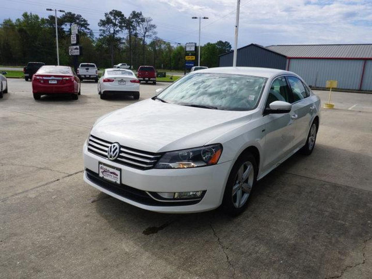 2015 White Volkswagen Passat (1VWAT7A32FC) with an 1.8L 4Cyl Turbo engine, Automatic transmission, located at 6904 Johnston St., Lafayette, LA, 70503, (337) 988-1960, 30.143589, -92.100601 - Prices are subject to change as improvements done by the service dept. Prices are for Cash sales only, Plus TTL. This Vehicle is Serviced well and Warranties Available too. Easy Financing. Drives Great and everything works. Price subject to change as improvements done by the service dept. Easy CR - Photo#4