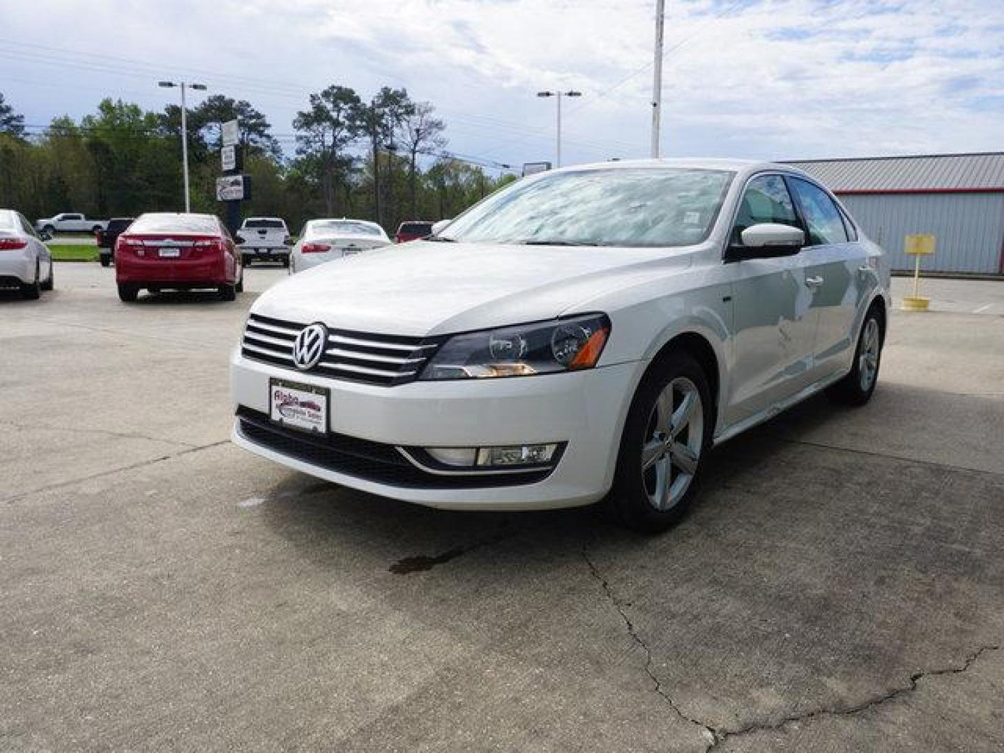 2015 White Volkswagen Passat (1VWAT7A32FC) with an 1.8L 4Cyl Turbo engine, Automatic transmission, located at 6904 Johnston St., Lafayette, LA, 70503, (337) 988-1960, 30.143589, -92.100601 - Prices are subject to change as improvements done by the service dept. Prices are for Cash sales only, Plus TTL. This Vehicle is Serviced well and Warranties Available too. Easy Financing. Drives Great and everything works. Price subject to change as improvements done by the service dept. Easy CR - Photo#5