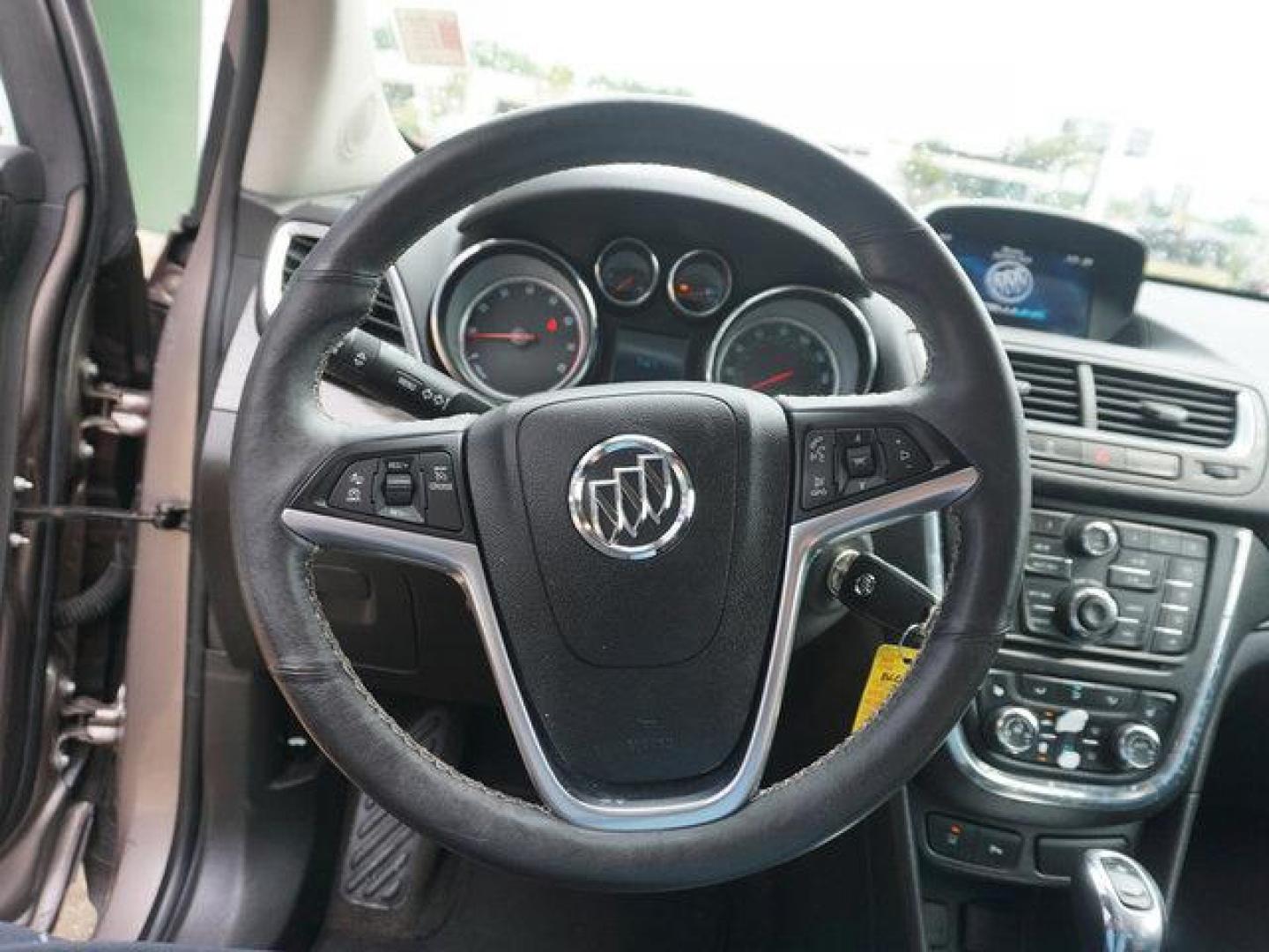 2014 Brown Buick Encore (KL4CJDSB3EB) with an 1.4L I4 Turbo engine, Automatic transmission, located at 6904 Johnston St., Lafayette, LA, 70503, (337) 988-1960, 30.143589, -92.100601 - Prices are subject to change as improvements done by the service dept. Prices are for Cash sales only, Plus TTL. This Vehicle is Serviced well and Warranties Available too. Easy Financing. Drives Great and everything works. Price subject to change as improvements done by the service dept. Easy CR - Photo#26