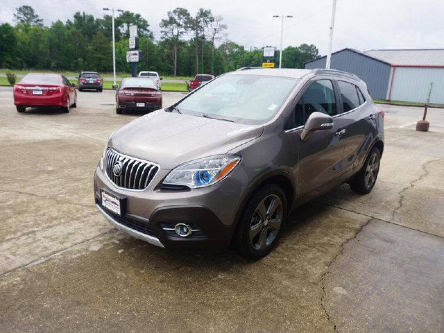 2014 Brown Buick Encore (KL4CJDSB3EB) with an 1.4L I4 Turbo engine, Automatic transmission, located at 6904 Johnston St., Lafayette, LA, 70503, (337) 988-1960, 30.143589, -92.100601 - Prices are subject to change as improvements done by the service dept. Prices are for Cash sales only, Plus TTL. This Vehicle is Serviced well and Warranties Available too. Easy Financing. Drives Great and everything works. Price subject to change as improvements done by the service dept. Easy CR - Photo#4