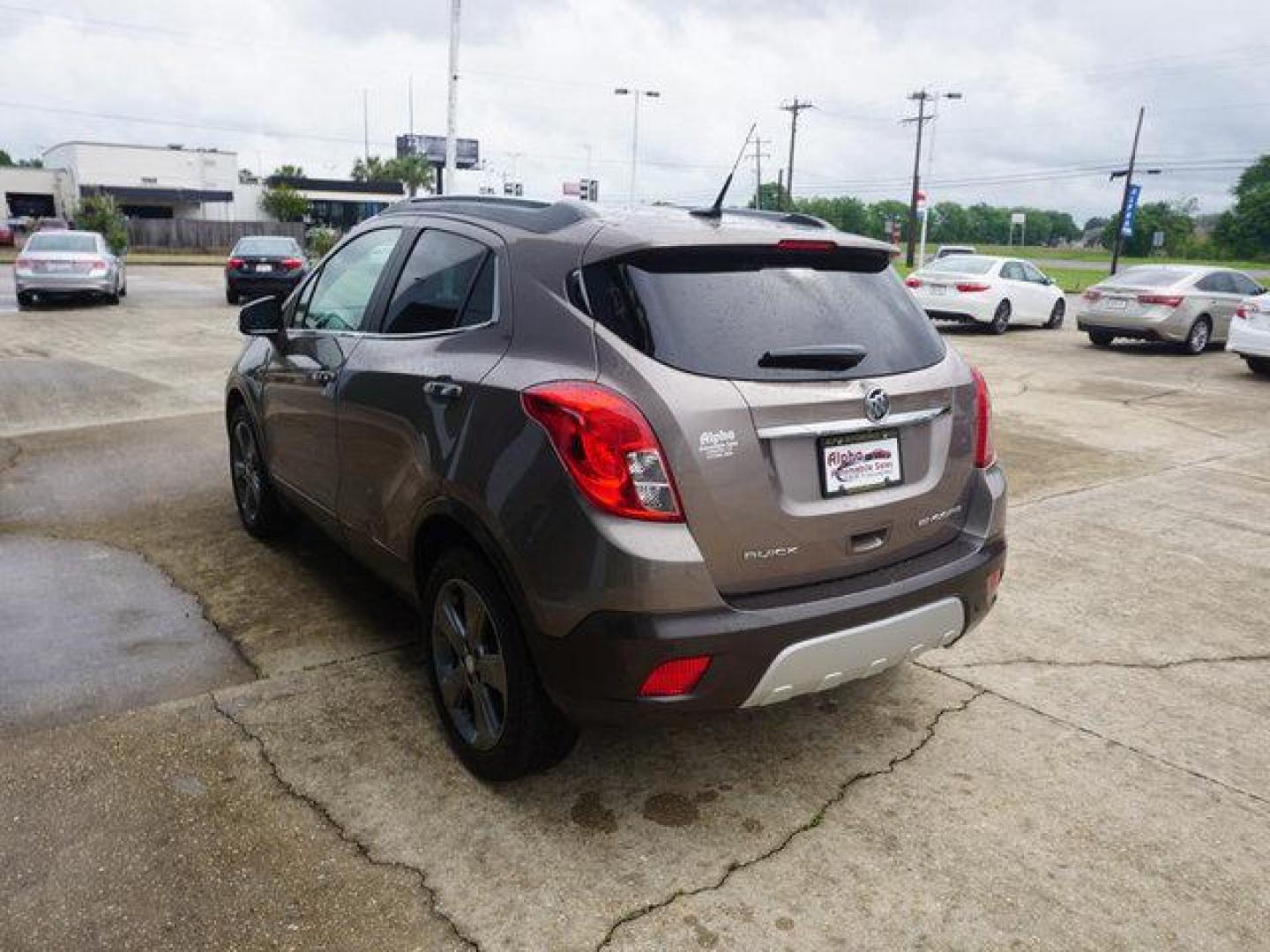 2014 Brown Buick Encore (KL4CJDSB3EB) with an 1.4L I4 Turbo engine, Automatic transmission, located at 6904 Johnston St., Lafayette, LA, 70503, (337) 988-1960, 30.143589, -92.100601 - Prices are subject to change as improvements done by the service dept. Prices are for Cash sales only, Plus TTL. This Vehicle is Serviced well and Warranties Available too. Easy Financing. Drives Great and everything works. Price subject to change as improvements done by the service dept. Easy CR - Photo#7