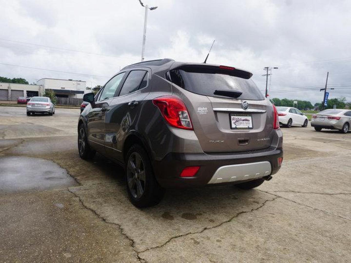 2014 Brown Buick Encore (KL4CJDSB3EB) with an 1.4L I4 Turbo engine, Automatic transmission, located at 6904 Johnston St., Lafayette, LA, 70503, (337) 988-1960, 30.143589, -92.100601 - Prices are subject to change as improvements done by the service dept. Prices are for Cash sales only, Plus TTL. This Vehicle is Serviced well and Warranties Available too. Easy Financing. Drives Great and everything works. Price subject to change as improvements done by the service dept. Easy CR - Photo#8