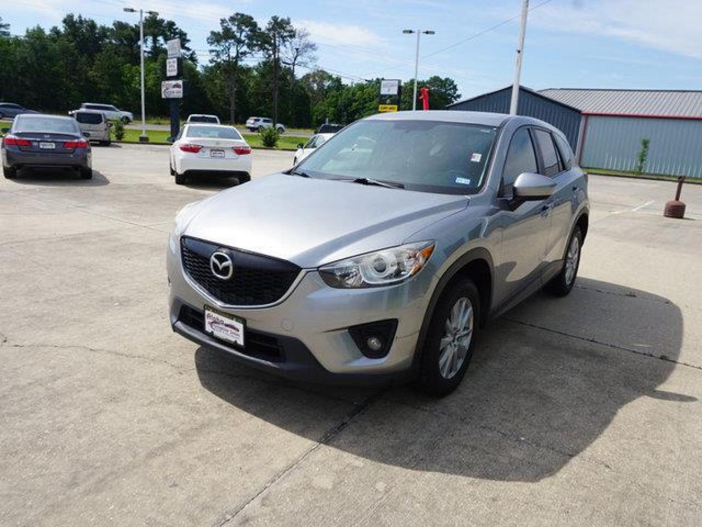 2014 Liquid Silver Metallic /Black Mazda CX-5 FWD 4dr Auto Touring (JM3KE2CY6E0) with an 2.5L 4Cyl engine, Automatic transmission, located at 6904 Johnston St., Lafayette, LA, 70503, (337) 988-1960, 30.143589, -92.100601 - Photo#4