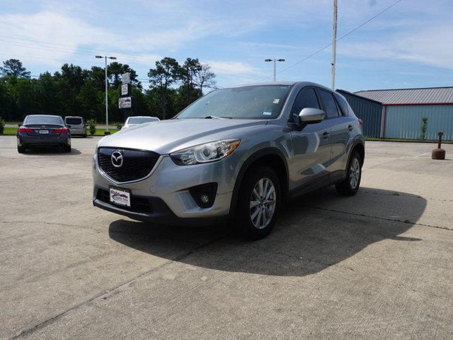 2014 Liquid Silver Metallic /Black Mazda CX-5 FWD 4dr Auto Touring (JM3KE2CY6E0) with an 2.5L 4Cyl engine, Automatic transmission, located at 6904 Johnston St., Lafayette, LA, 70503, (337) 988-1960, 30.143589, -92.100601 - Photo#5