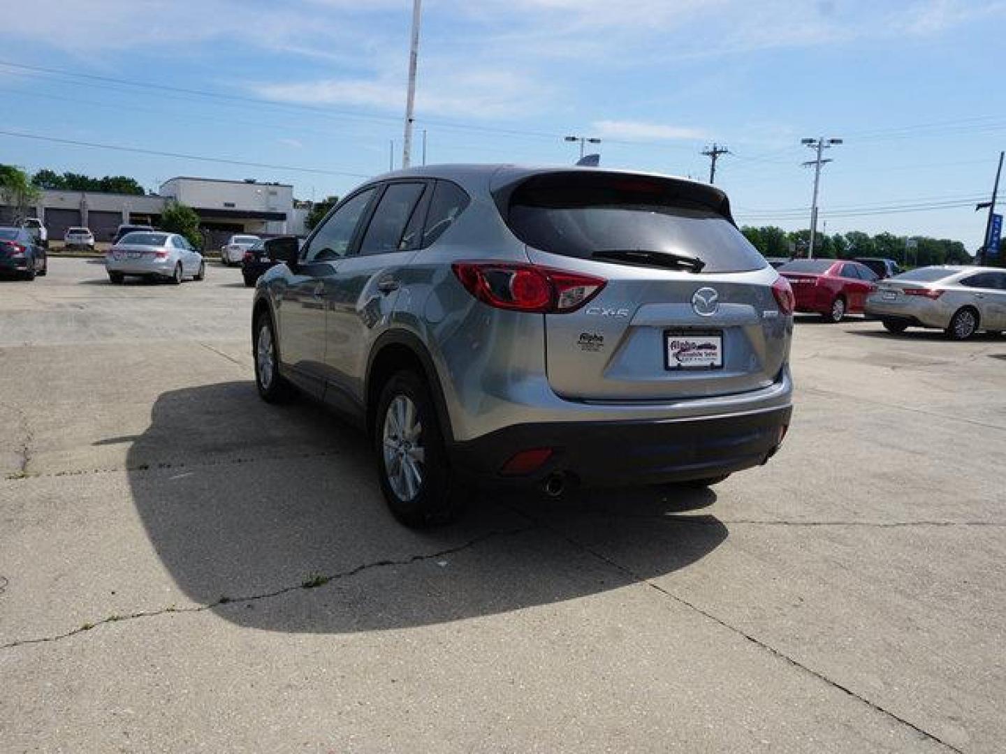 2014 Liquid Silver Metallic /Black Mazda CX-5 FWD 4dr Auto Touring (JM3KE2CY6E0) with an 2.5L 4Cyl engine, Automatic transmission, located at 6904 Johnston St., Lafayette, LA, 70503, (337) 988-1960, 30.143589, -92.100601 - Photo#8