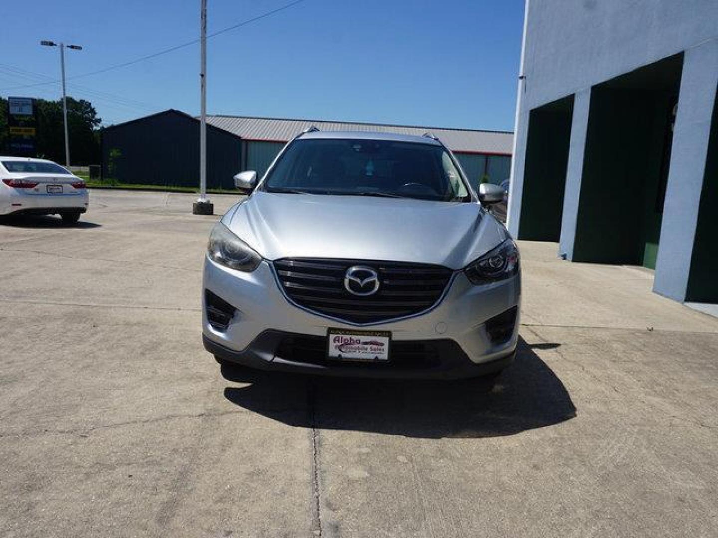 2016 Sonic Silver Metallic /Black Mazda CX-5 FWD 4dr Auto Touring (JM3KE2CY8G0) with an 2.5L 4Cyl engine, Automatic transmission, located at 6904 Johnston St., Lafayette, LA, 70503, (337) 988-1960, 30.143589, -92.100601 - Photo#4