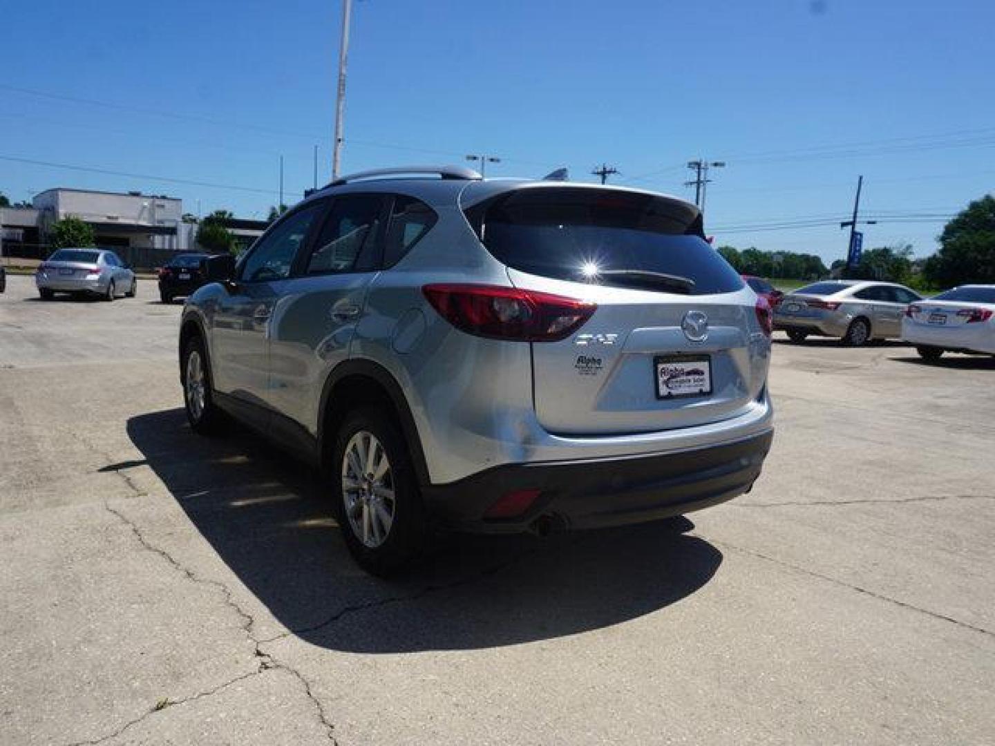 2016 Sonic Silver Metallic /Black Mazda CX-5 FWD 4dr Auto Touring (JM3KE2CY8G0) with an 2.5L 4Cyl engine, Automatic transmission, located at 6904 Johnston St., Lafayette, LA, 70503, (337) 988-1960, 30.143589, -92.100601 - Photo#9