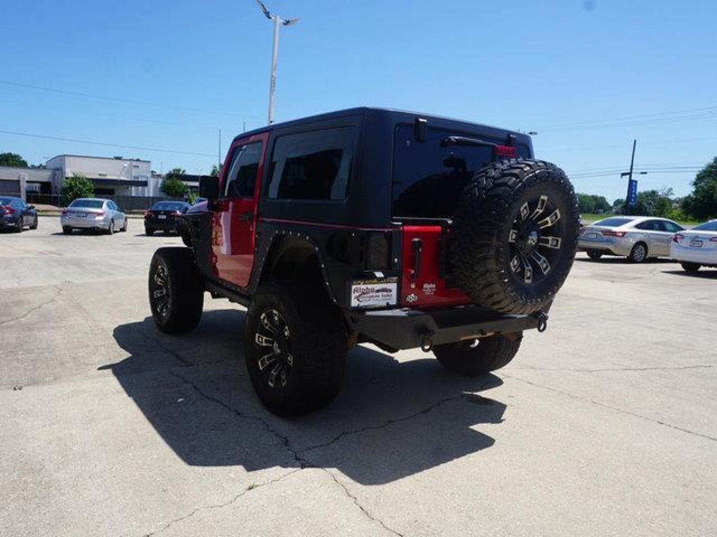 2012 Red /Black Interior Jeep Wrangler 4WD 2dr Rubicon (1C4BJWCG9CL) with an 3.6L V6 engine, 6 Spd Automatic transmission, located at 6904 Johnston St., Lafayette, LA, 70503, (337) 988-1960, 30.143589, -92.100601 - Photo#8