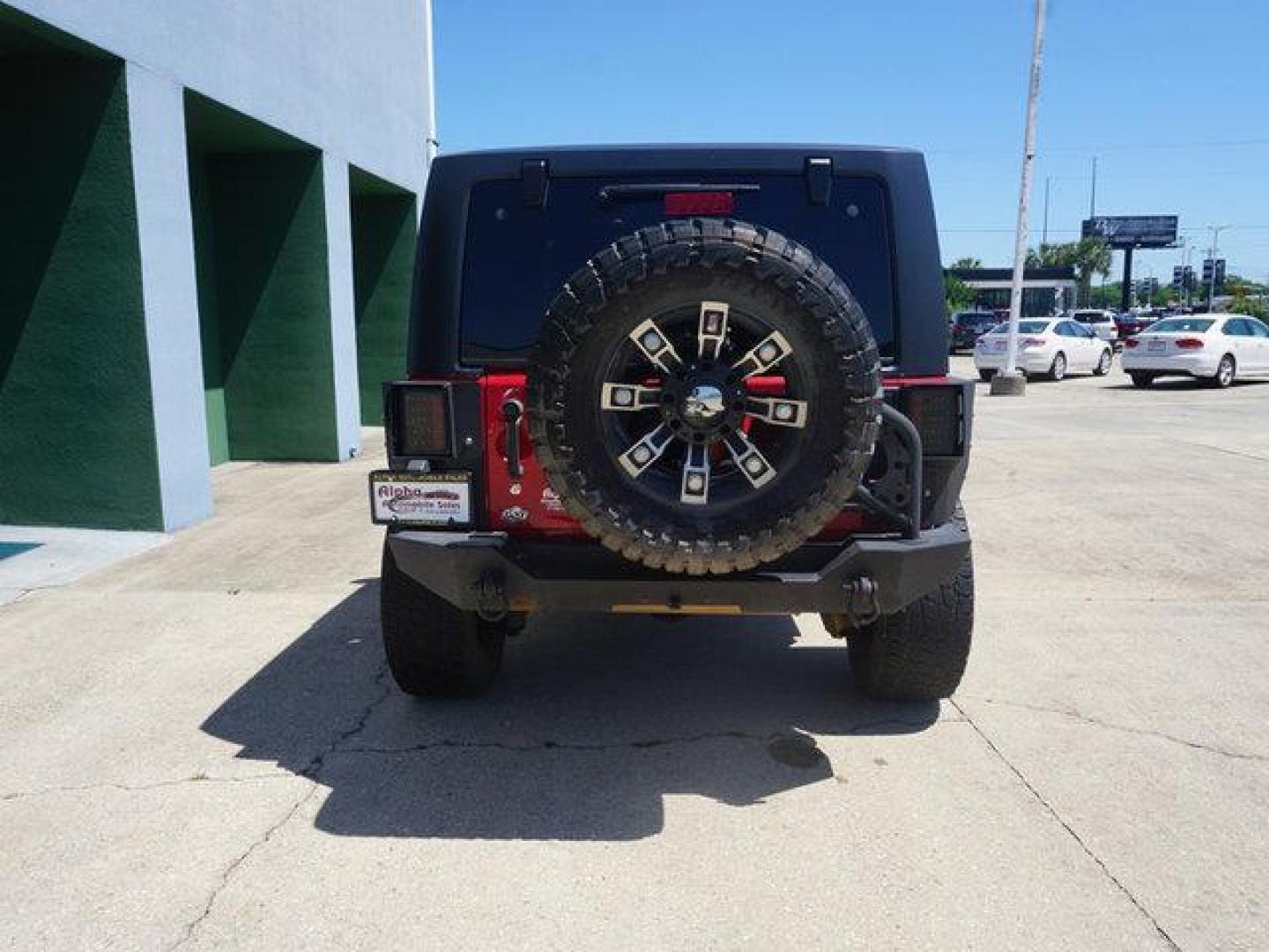 2012 Red /Black Interior Jeep Wrangler 4WD 2dr Rubicon (1C4BJWCG9CL) with an 3.6L V6 engine, 6 Spd Automatic transmission, located at 6904 Johnston St., Lafayette, LA, 70503, (337) 988-1960, 30.143589, -92.100601 - Photo#10