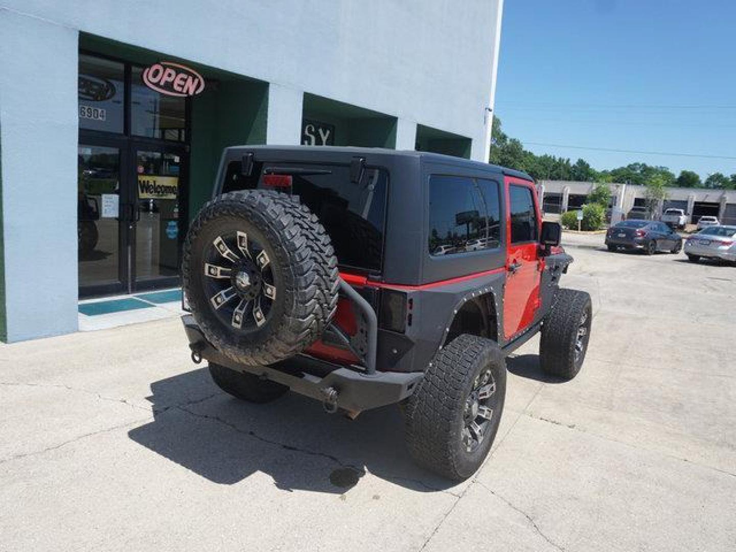 2012 Red /Black Interior Jeep Wrangler 4WD 2dr Rubicon (1C4BJWCG9CL) with an 3.6L V6 engine, 6 Spd Automatic transmission, located at 6904 Johnston St., Lafayette, LA, 70503, (337) 988-1960, 30.143589, -92.100601 - Photo#11