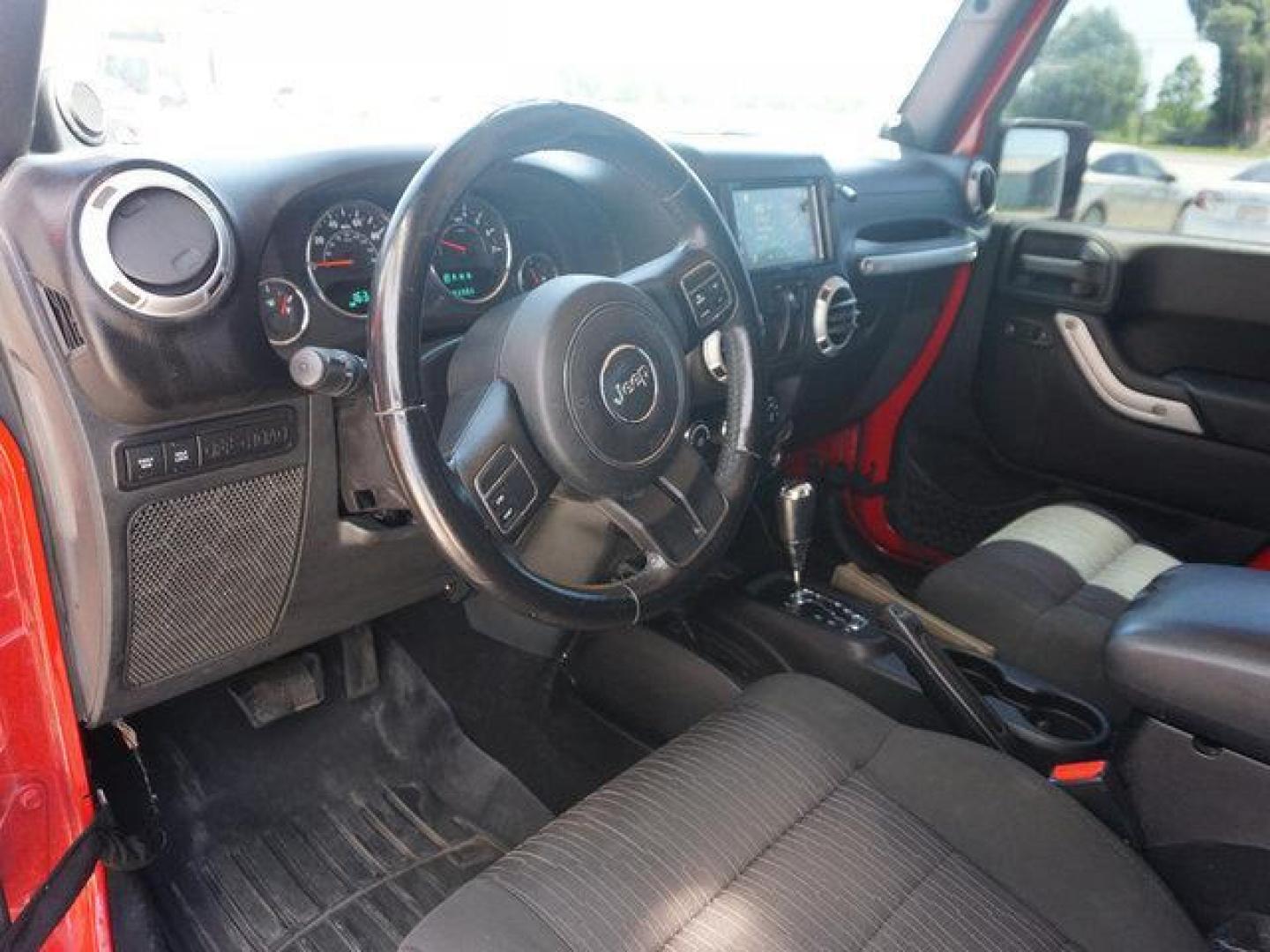 2012 Red /Black Interior Jeep Wrangler 4WD 2dr Rubicon (1C4BJWCG9CL) with an 3.6L V6 engine, 6 Spd Automatic transmission, located at 6904 Johnston St., Lafayette, LA, 70503, (337) 988-1960, 30.143589, -92.100601 - Photo#23