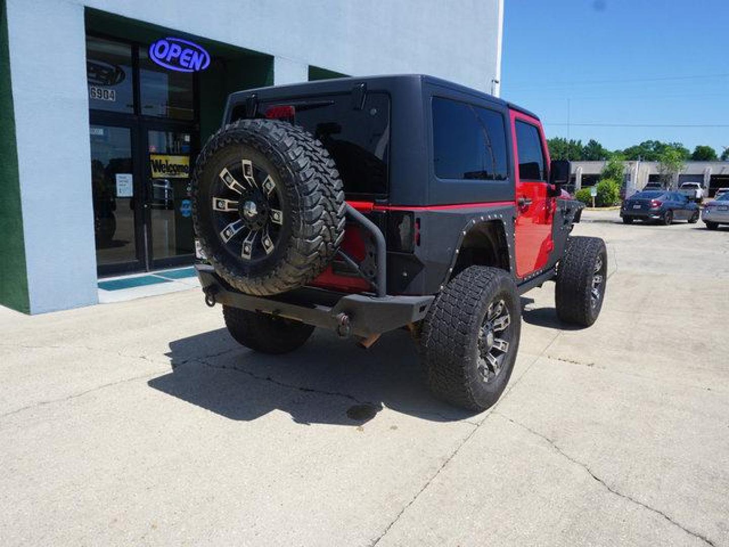 2012 Red Jeep Wrangler (1C4BJWCG9CL) with an 3.6L V6 engine, 6 Spd Automatic transmission, located at 6904 Johnston St., Lafayette, LA, 70503, (337) 988-1960, 30.143589, -92.100601 - beautiful Jeep Prices are subject to change as improvements done by the service dept. Prices are for Cash sales only, Plus TTL. This Vehicle is Serviced well and Warranties Available too. Easy Financing. Drives Great and everything works. Price subject to change as improvements done by the servi - Photo#12