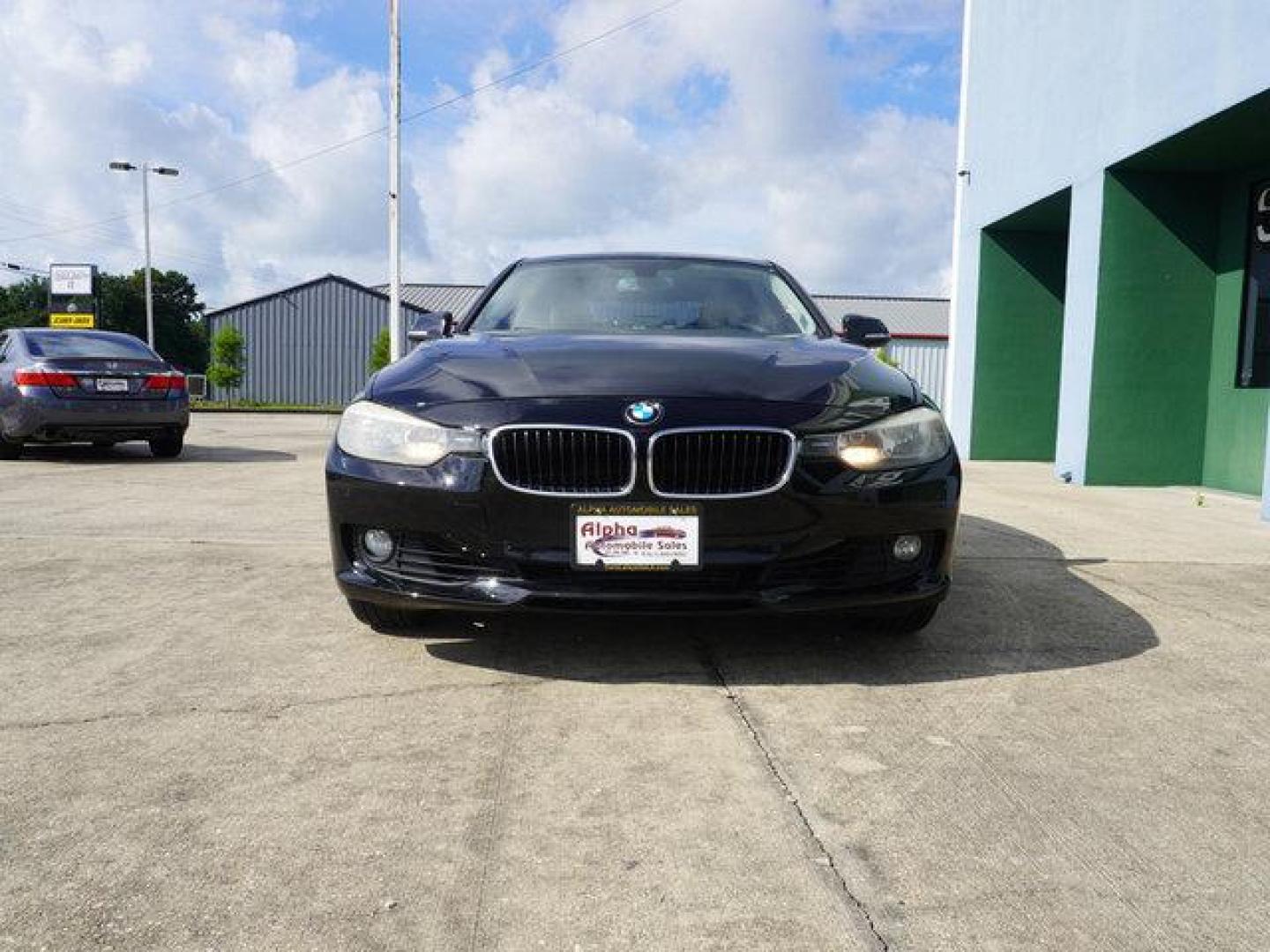 2014 Black BMW 3 Series (WBA3A5G52EN) with an 2.0L 4 Cyl engine, 8 Spd Automatic transmission, located at 6904 Johnston St., Lafayette, LA, 70503, (337) 988-1960, 30.143589, -92.100601 - Beautiful luxury. Well kept. Got to see it. Prices are subject to change as improvements done by the service dept. Prices are for Cash sales only, Plus TTL. This Vehicle is Serviced well and Warranties Available too. Easy Financing. Drives Great and everything works. Price subject to change as i - Photo#3