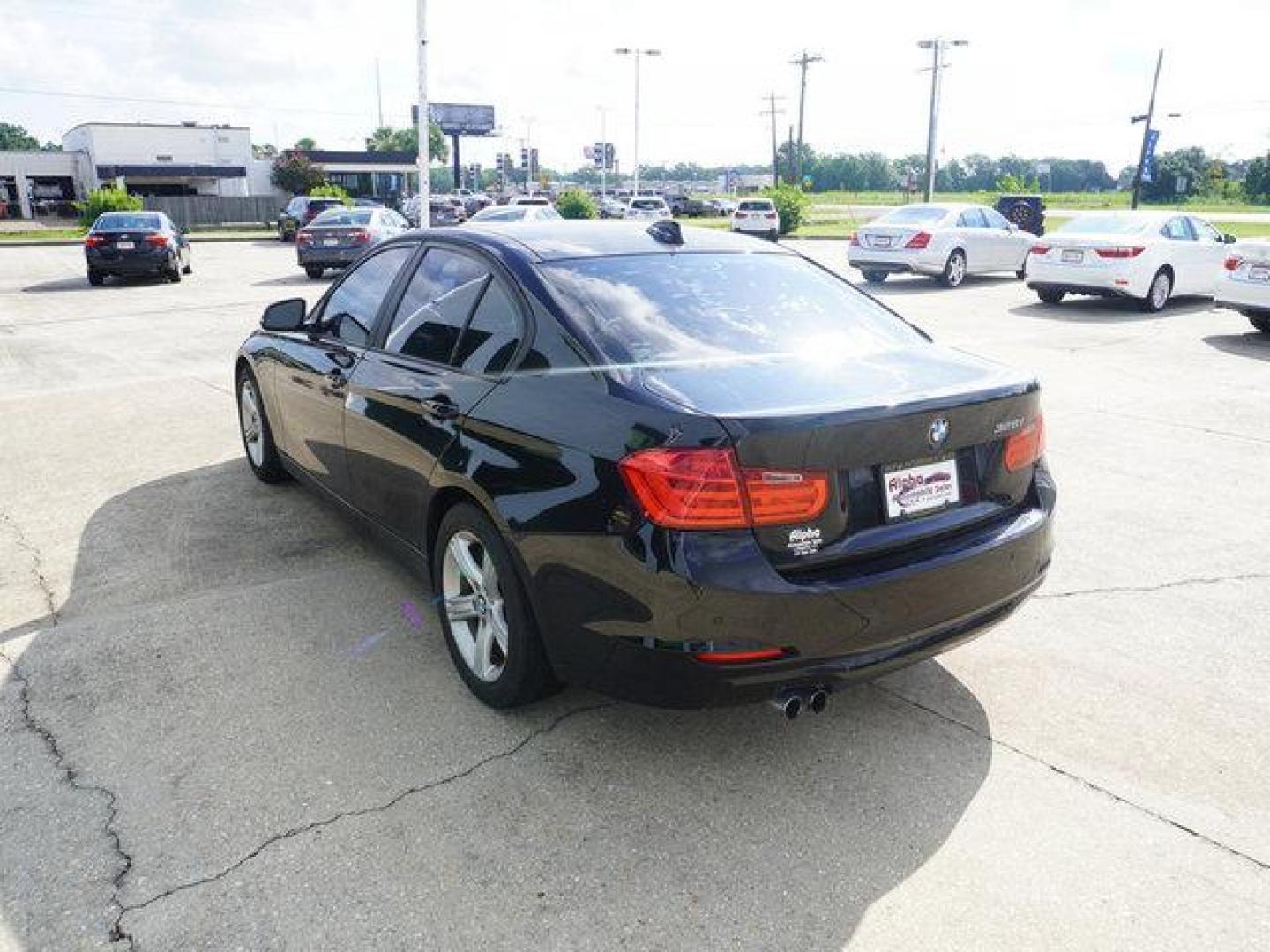 2014 Black BMW 3 Series (WBA3A5G52EN) with an 2.0L 4 Cyl engine, 8 Spd Automatic transmission, located at 6904 Johnston St., Lafayette, LA, 70503, (337) 988-1960, 30.143589, -92.100601 - Beautiful luxury. Well kept. Got to see it. Prices are subject to change as improvements done by the service dept. Prices are for Cash sales only, Plus TTL. This Vehicle is Serviced well and Warranties Available too. Easy Financing. Drives Great and everything works. Price subject to change as i - Photo#7