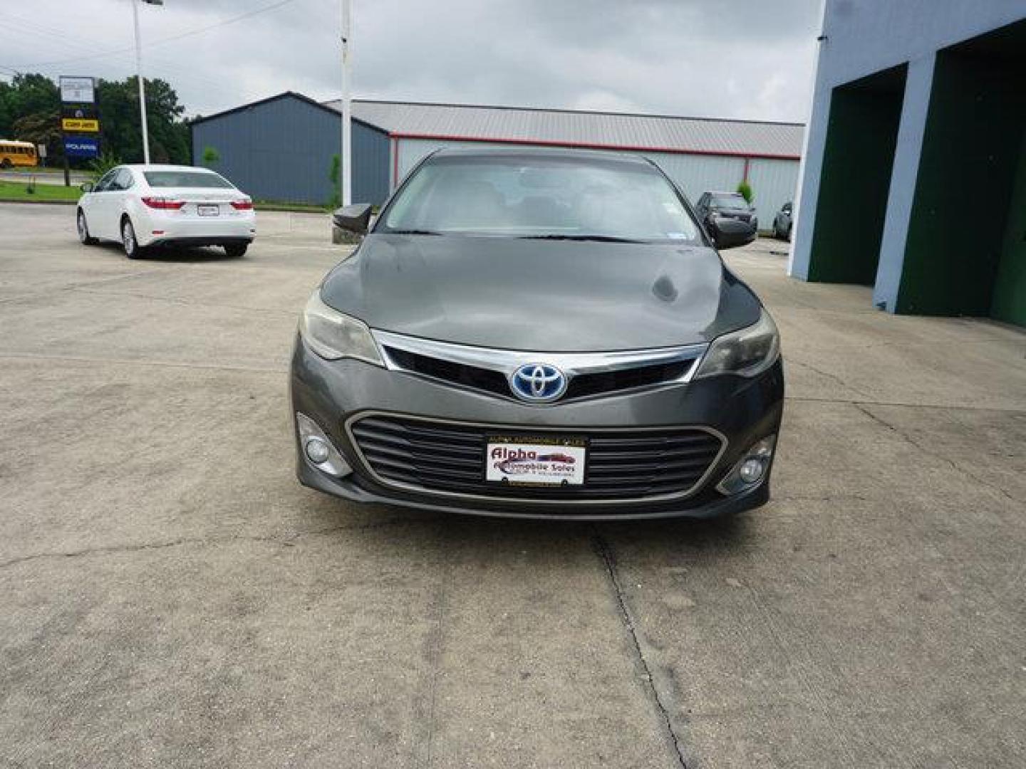 2013 Green /Almond Toyota Avalon 4dr Sdn XLE Premium (Natl) (4T1BD1EB7DU) with an 2.5L 4Cyl engine, Automatic transmission, located at 6904 Johnston St., Lafayette, LA, 70503, (337) 988-1960, 30.143589, -92.100601 - Photo#3