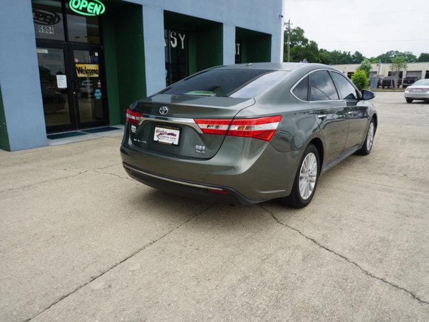 2013 Green Toyota Avalon (4T1BD1EB7DU) with an 2.5L 4Cyl engine, Automatic transmission, located at 6904 Johnston St., Lafayette, LA, 70503, (337) 988-1960, 30.143589, -92.100601 - Prices are subject to change as improvements done by the service dept. Prices are for Cash sales only, Plus TTL. This Vehicle is Serviced well and Warranties Available too. Easy Financing. Drives Great and everything works. Price subject to change as improvements done by the service dept. Easy CR - Photo#12