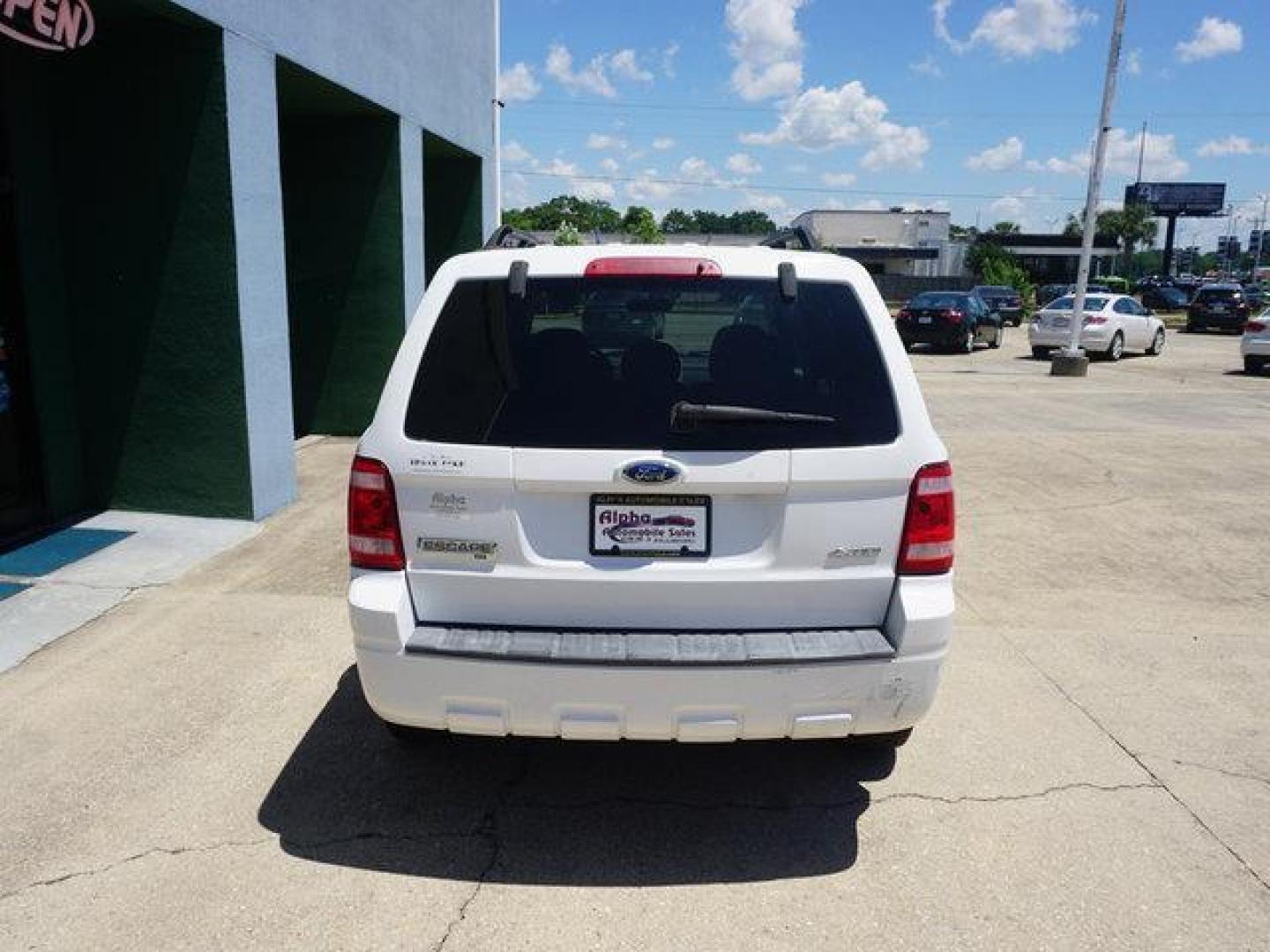 2008 Oxford White /Camel Ford Escape 4WD 4dr I4 Auto XLT (1FMCU93Z98K) with an 2.3L 4Cyl engine, Automatic transmission, located at 6904 Johnston St., Lafayette, LA, 70503, (337) 988-1960, 30.143589, -92.100601 - Photo#9