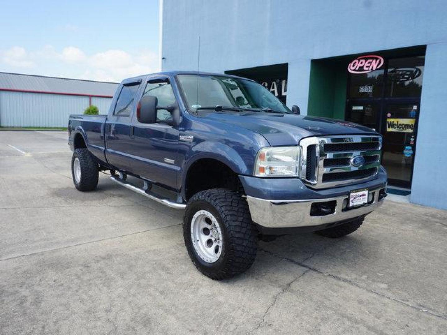 2006 Blue Ford F-350 (1FTWW31P56E) with an 6.0L 8 Cyl engine, 6 Spd Hd Automatic transmission, located at 6904 Johnston St., Lafayette, LA, 70503, (337) 988-1960, 30.143589, -92.100601 - Prices are subject to change as improvements done by the service dept. Prices are for Cash sales only, Plus TTL. This Vehicle is Serviced well and Warranties Available too. Easy Financing. Drives Great and everything works. Price subject to change as improvements done by the service dept. Easy CR - Photo#1