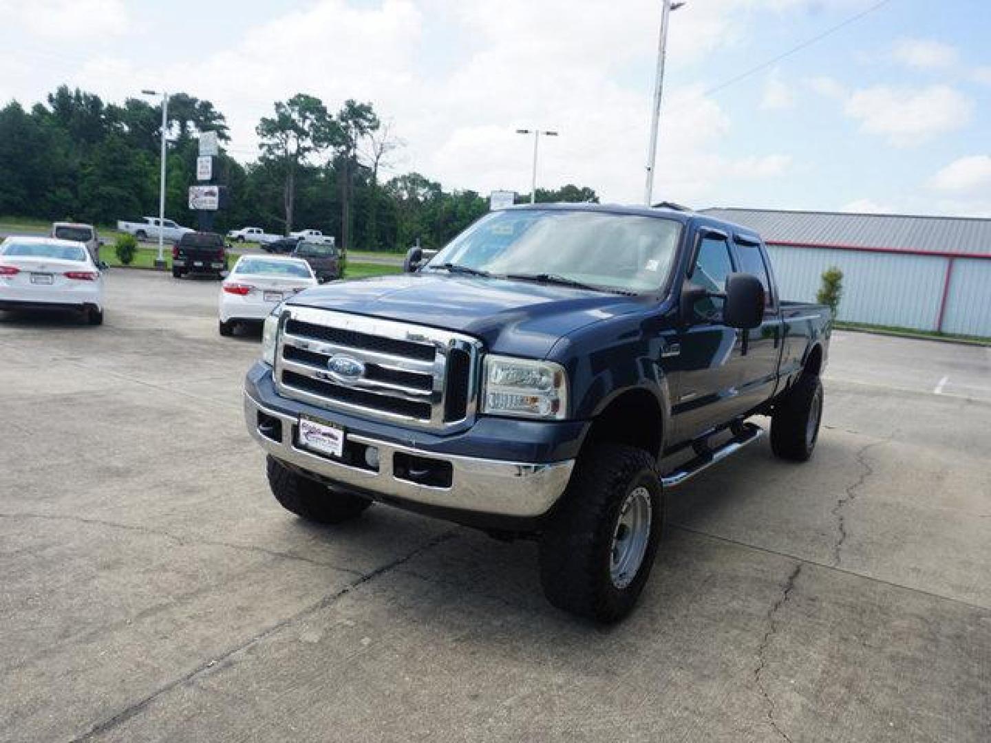 2006 Blue Ford F-350 (1FTWW31P56E) with an 6.0L 8 Cyl engine, 6 Spd Hd Automatic transmission, located at 6904 Johnston St., Lafayette, LA, 70503, (337) 988-1960, 30.143589, -92.100601 - Prices are subject to change as improvements done by the service dept. Prices are for Cash sales only, Plus TTL. This Vehicle is Serviced well and Warranties Available too. Easy Financing. Drives Great and everything works. Price subject to change as improvements done by the service dept. Easy CR - Photo#4