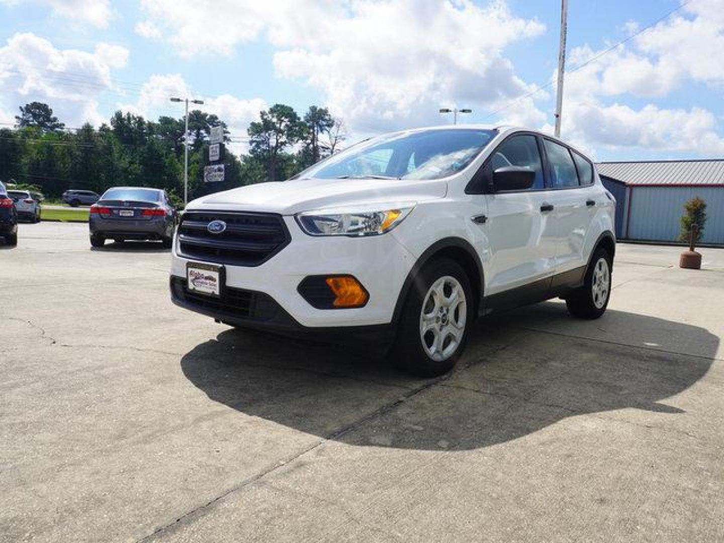 2017 White Ford Escape (1FMCU0F78HU) with an 2.5L 4Cyl engine, Automatic transmission, located at 6904 Johnston St., Lafayette, LA, 70503, (337) 988-1960, 30.143589, -92.100601 - Prices are subject to change as improvements done by the service dept. Prices are for Cash sales only, Plus TTL. This Vehicle is Serviced well and Warranties Available too. Easy Financing. Drives Great and everything works. Price subject to change as improvements done by the service dept. Easy CR - Photo#5