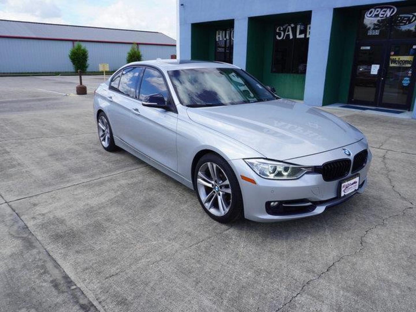 2015 Silver /Black w/Red Highlight BMW 3 Series 4dr Sdn 328i RWD (WBA3A5C54FF) with an 2.0L 4Cyl Turbo engine, 8 Spd Automatic transmission, located at 6904 Johnston St., Lafayette, LA, 70503, (337) 988-1960, 30.143589, -92.100601 - Photo#1