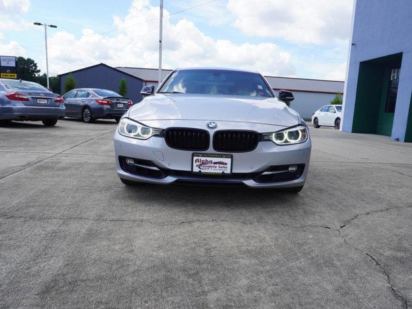 2015 Silver /Black w/Red Highlight BMW 3 Series 4dr Sdn 328i RWD (WBA3A5C54FF) with an 2.0L 4Cyl Turbo engine, 8 Spd Automatic transmission, located at 6904 Johnston St., Lafayette, LA, 70503, (337) 988-1960, 30.143589, -92.100601 - Photo#3