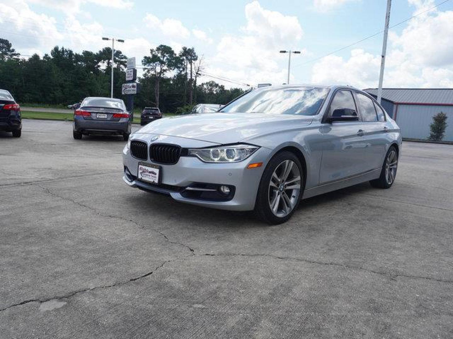 2015 Silver /Black w/Red Highlight BMW 3 Series 4dr Sdn 328i RWD (WBA3A5C54FF) with an 2.0L 4Cyl Turbo engine, 8 Spd Automatic transmission, located at 6904 Johnston St., Lafayette, LA, 70503, (337) 988-1960, 30.143589, -92.100601 - Photo#5