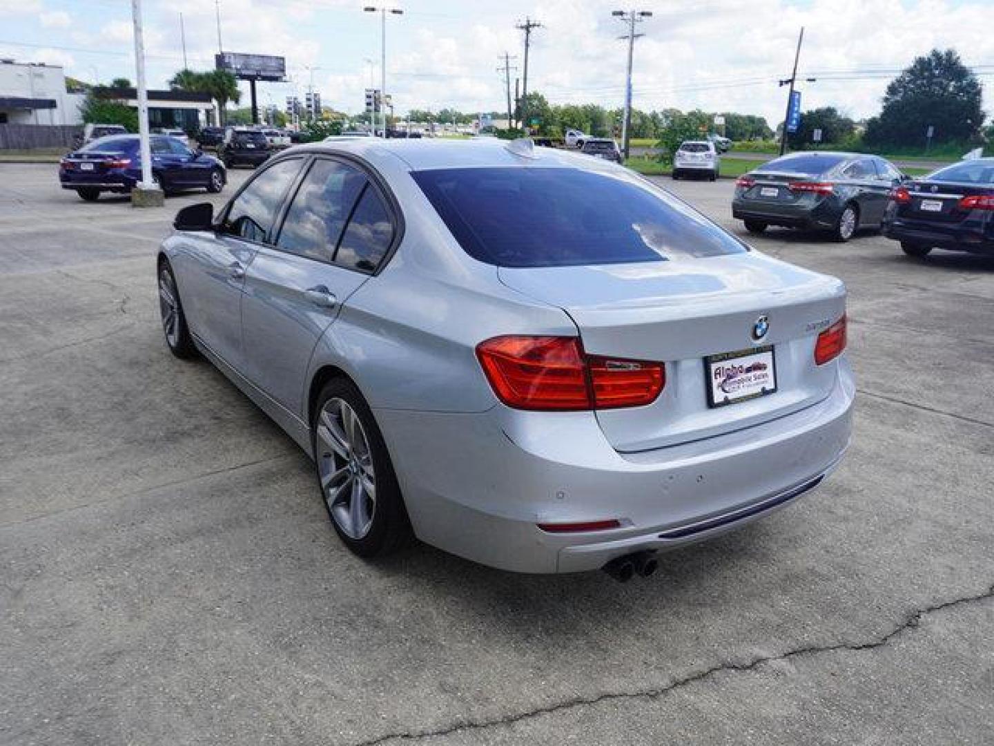 2015 Silver /Black w/Red Highlight BMW 3 Series 4dr Sdn 328i RWD (WBA3A5C54FF) with an 2.0L 4Cyl Turbo engine, 8 Spd Automatic transmission, located at 6904 Johnston St., Lafayette, LA, 70503, (337) 988-1960, 30.143589, -92.100601 - Photo#7