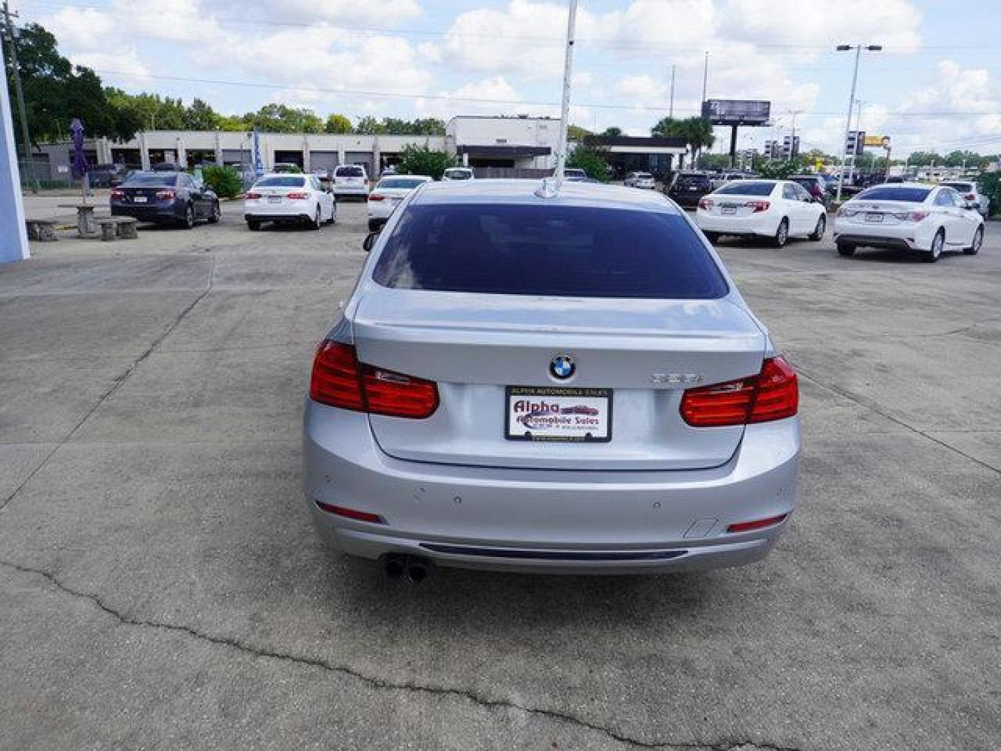 2015 Silver /Black w/Red Highlight BMW 3 Series 4dr Sdn 328i RWD (WBA3A5C54FF) with an 2.0L 4Cyl Turbo engine, 8 Spd Automatic transmission, located at 6904 Johnston St., Lafayette, LA, 70503, (337) 988-1960, 30.143589, -92.100601 - Photo#9