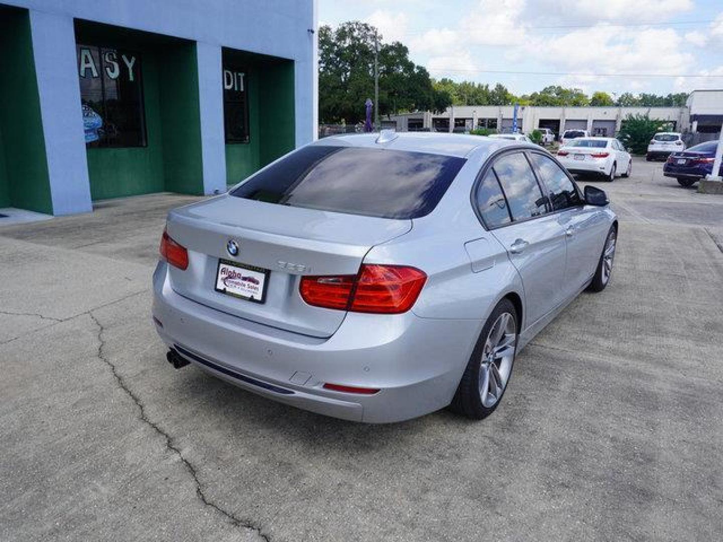 2015 Silver /Black w/Red Highlight BMW 3 Series 4dr Sdn 328i RWD (WBA3A5C54FF) with an 2.0L 4Cyl Turbo engine, 8 Spd Automatic transmission, located at 6904 Johnston St., Lafayette, LA, 70503, (337) 988-1960, 30.143589, -92.100601 - Photo#11