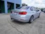 2015 Silver /Black w/Red Highlight BMW 3 Series 4dr Sdn 328i RWD (WBA3A5C54FF) with an 2.0L 4Cyl Turbo engine, 8 Spd Automatic transmission, located at 6904 Johnston St., Lafayette, LA, 70503, (337) 988-1960, 30.143589, -92.100601 - Photo#12