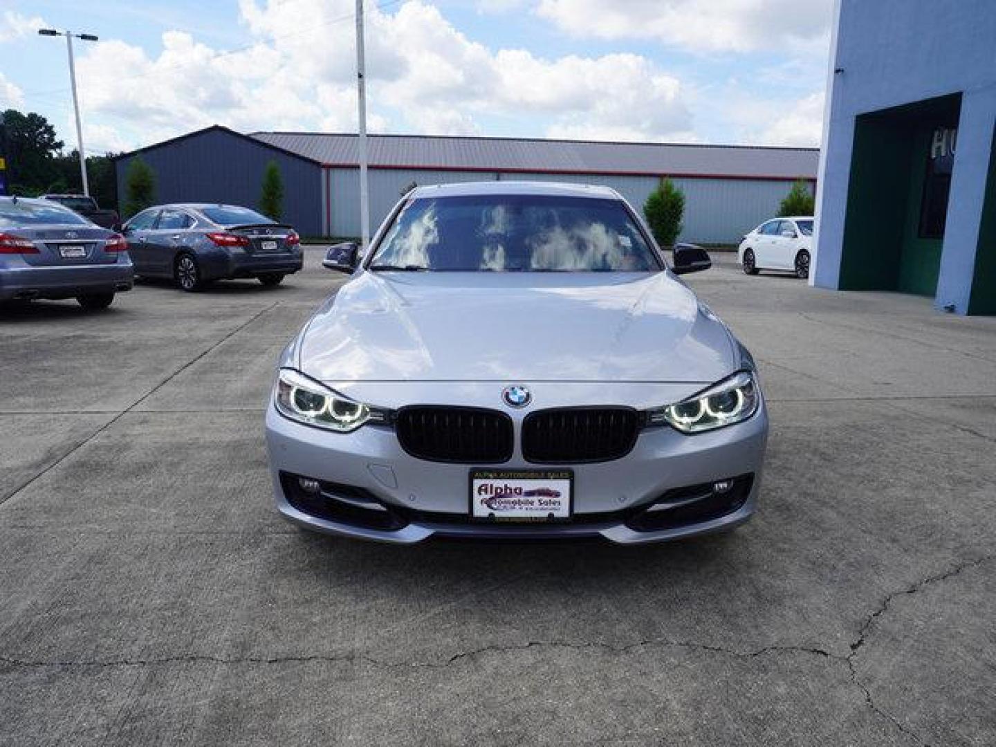 2015 Silver BMW 3 Series (WBA3A5C54FF) with an 2.0L 4Cyl Turbo engine, 8 Spd Automatic transmission, located at 6904 Johnston St., Lafayette, LA, 70503, (337) 988-1960, 30.143589, -92.100601 - Prices are subject to change as improvements done by the service dept. Prices are for Cash sales only, Plus TTL. This Vehicle is Serviced well and Warranties Available too. Easy Financing. Drives Great and everything works. Price subject to change as improvements done by the service dept. Easy CR - Photo#2