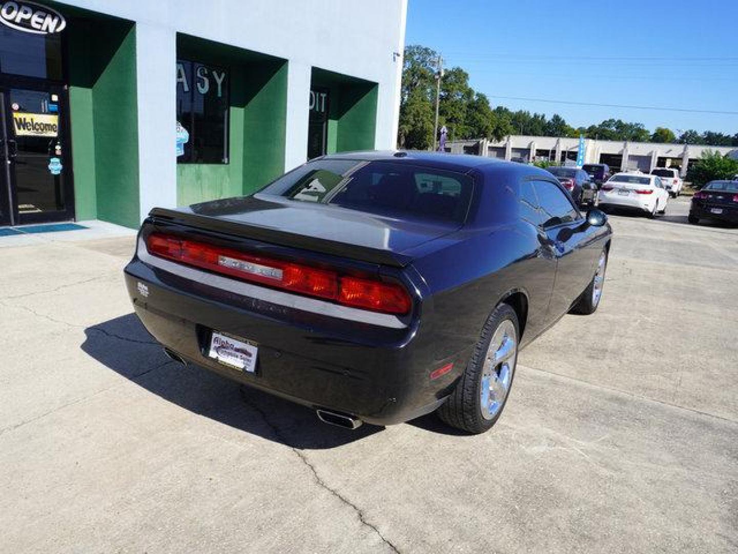 2013 Black Dodge Challenger (2C3CDYAG9DH) with an 3.6L V6 engine, 5 Spd Automatic transmission, located at 6904 Johnston St., Lafayette, LA, 70503, (337) 988-1960, 30.143589, -92.100601 - Prices are subject to change as improvements done by the service dept. Prices are for Cash sales only, Plus TTL. This Vehicle is Serviced well and Warranties Available too. Easy Financing. Drives Great and everything works. Price subject to change as improvements done by the service dept. Easy CR - Photo#11