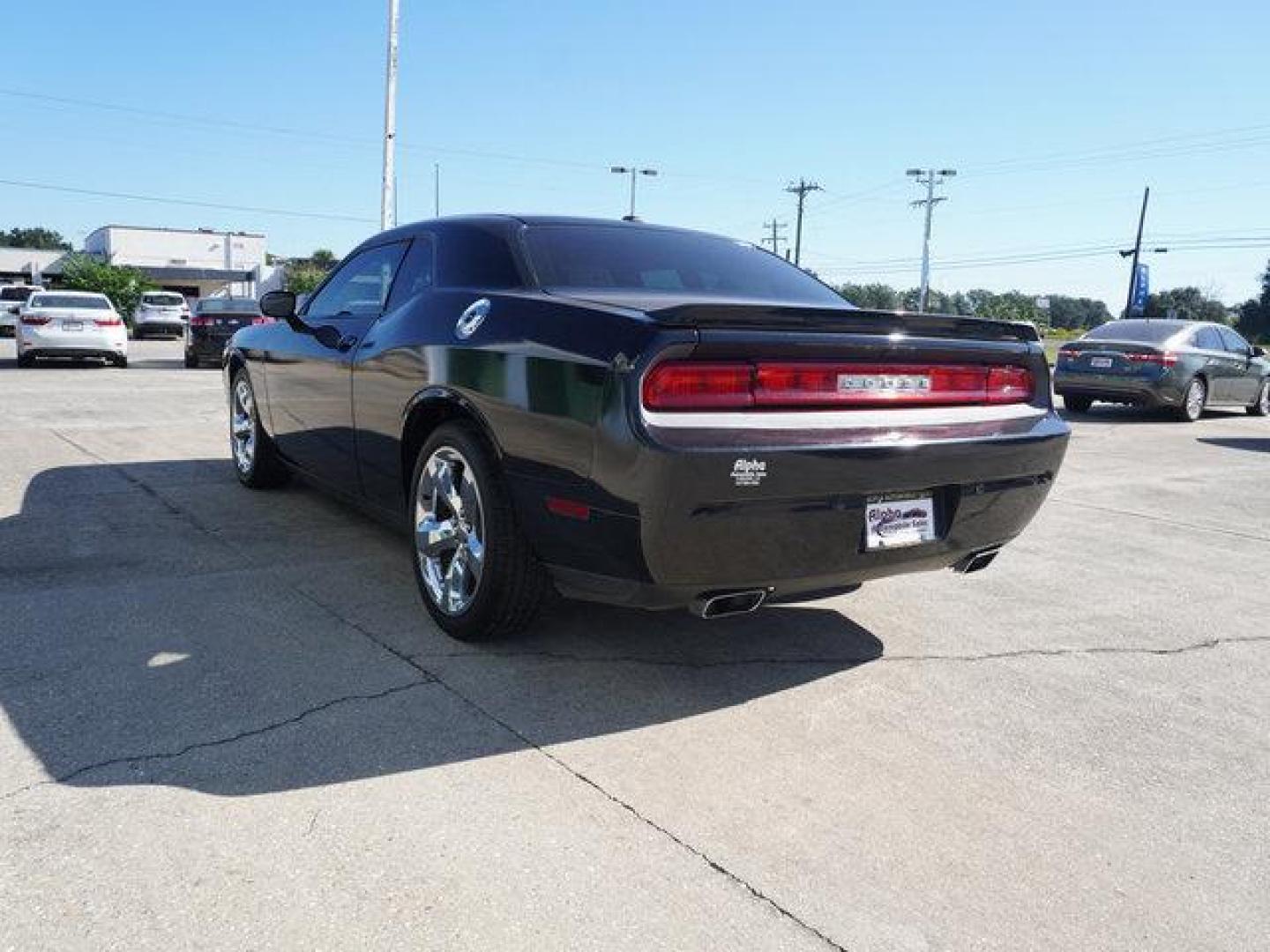 2013 Black Dodge Challenger (2C3CDYAG9DH) with an 3.6L V6 engine, 5 Spd Automatic transmission, located at 6904 Johnston St., Lafayette, LA, 70503, (337) 988-1960, 30.143589, -92.100601 - Prices are subject to change as improvements done by the service dept. Prices are for Cash sales only, Plus TTL. This Vehicle is Serviced well and Warranties Available too. Easy Financing. Drives Great and everything works. Price subject to change as improvements done by the service dept. Easy CR - Photo#8